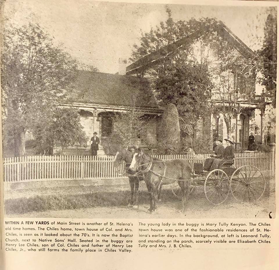 Historic house with horse-drawn buggy in front