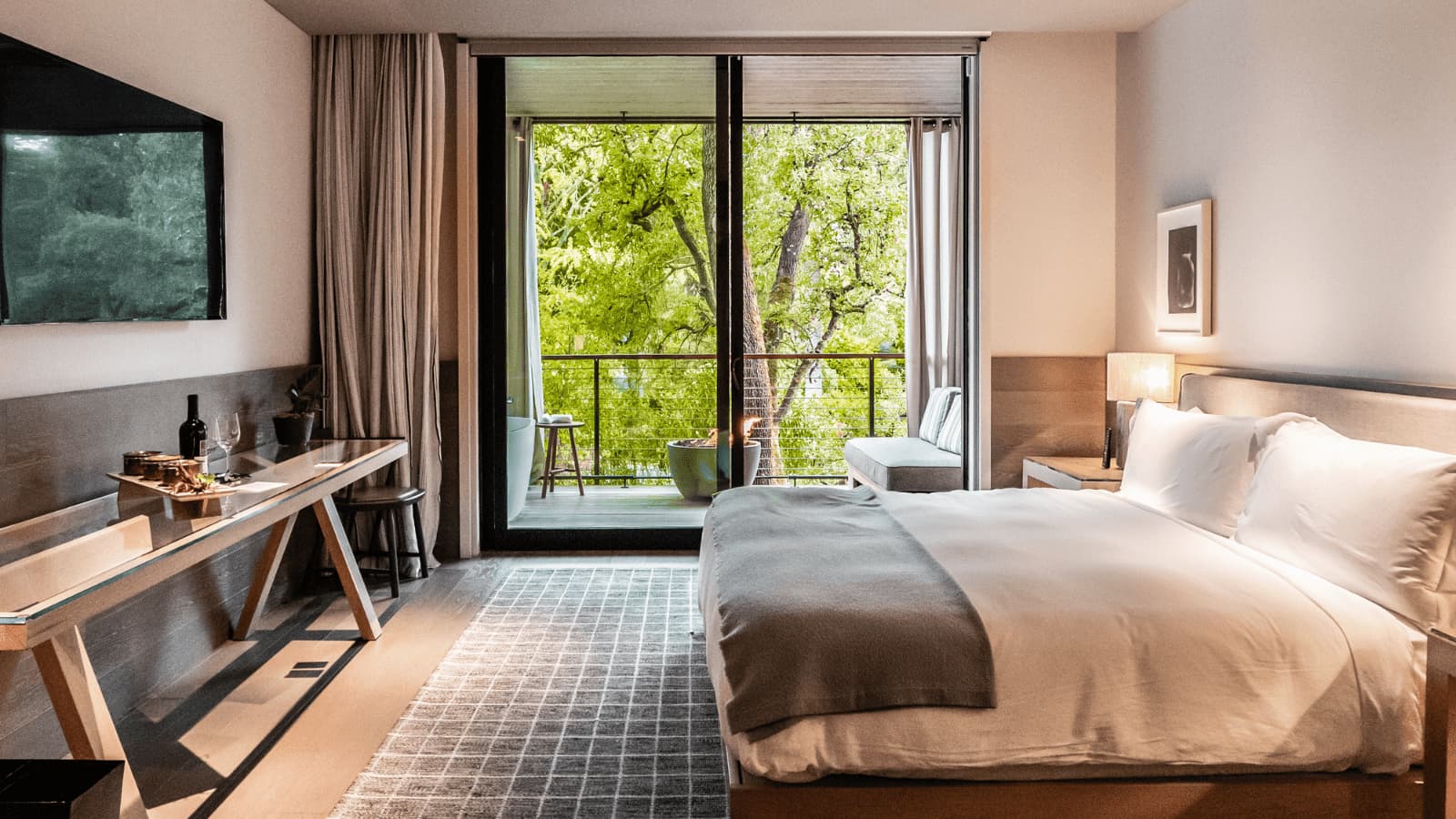 Cozy hotel room with a nature view.