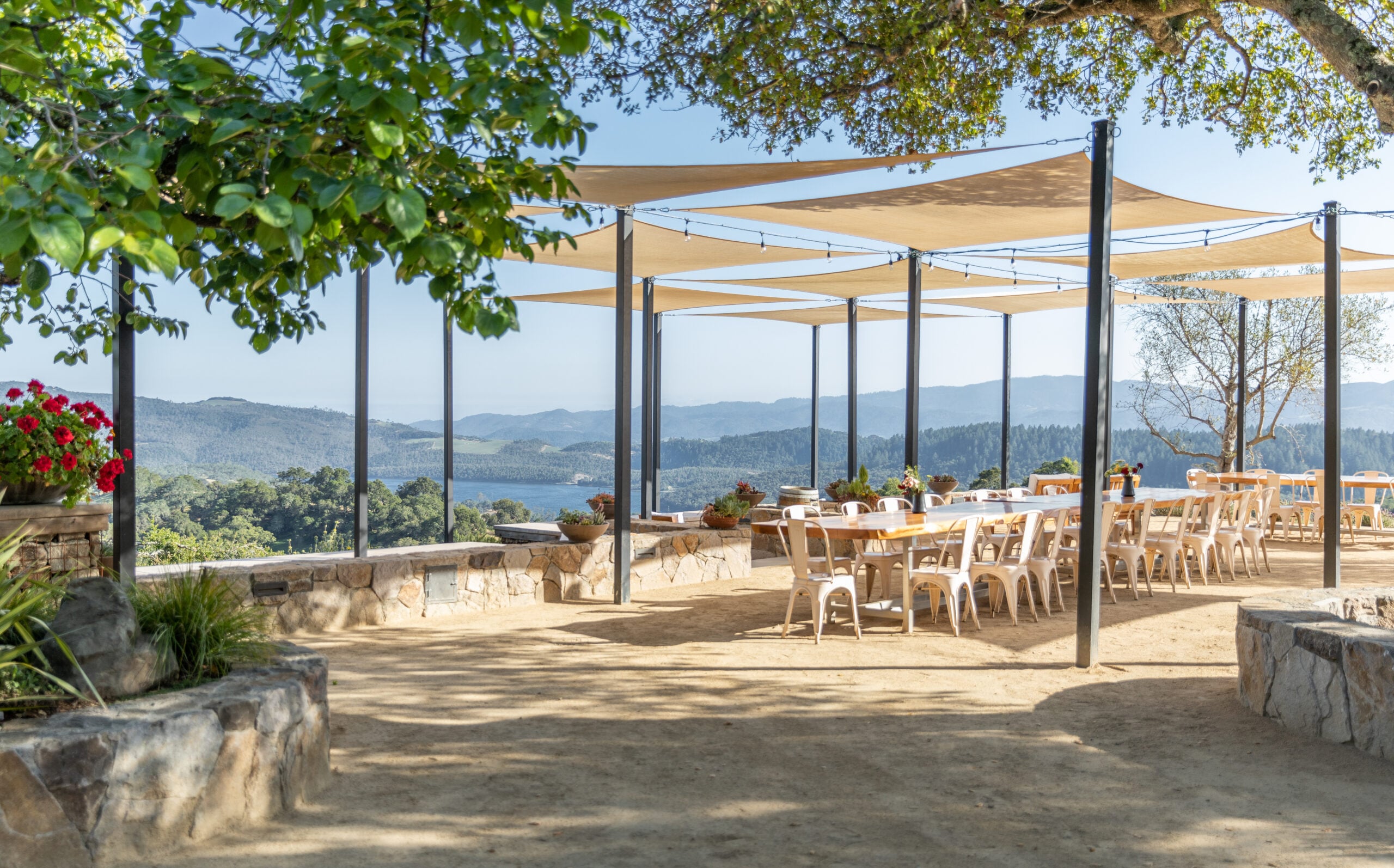 Outdoor patio with mountain view and shade sails