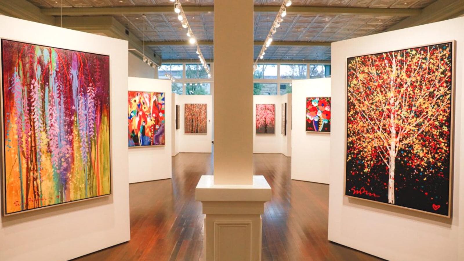 Colorful abstract paintings in art gallery