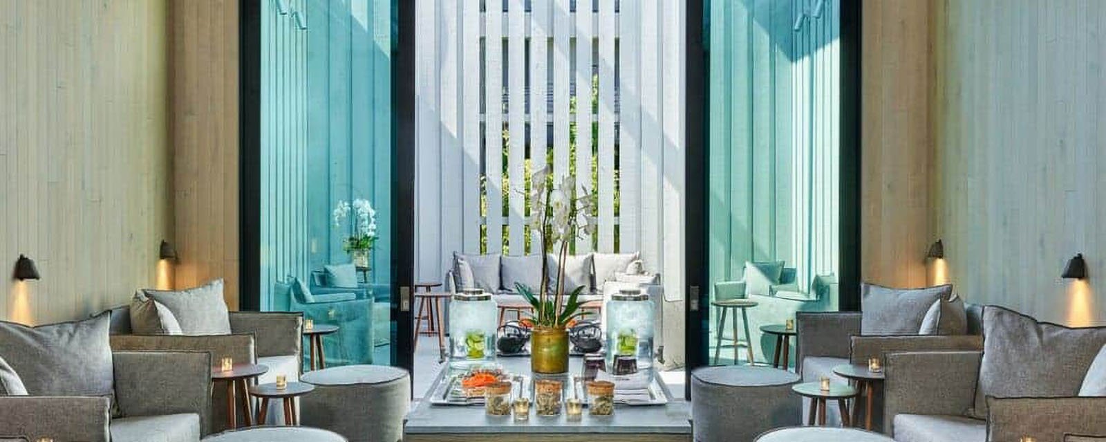 Modern indoor lounge area with large windows
