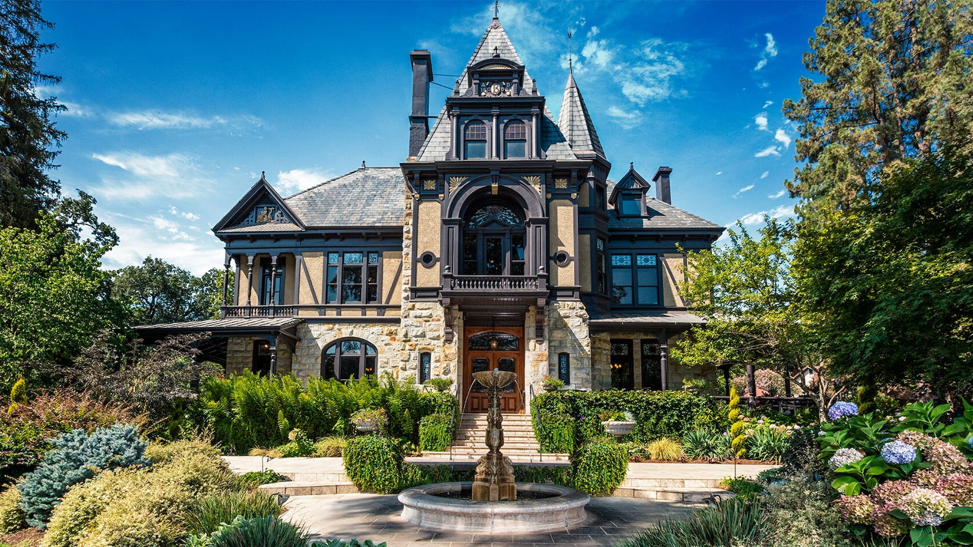 Historic mansion with garden and fountain