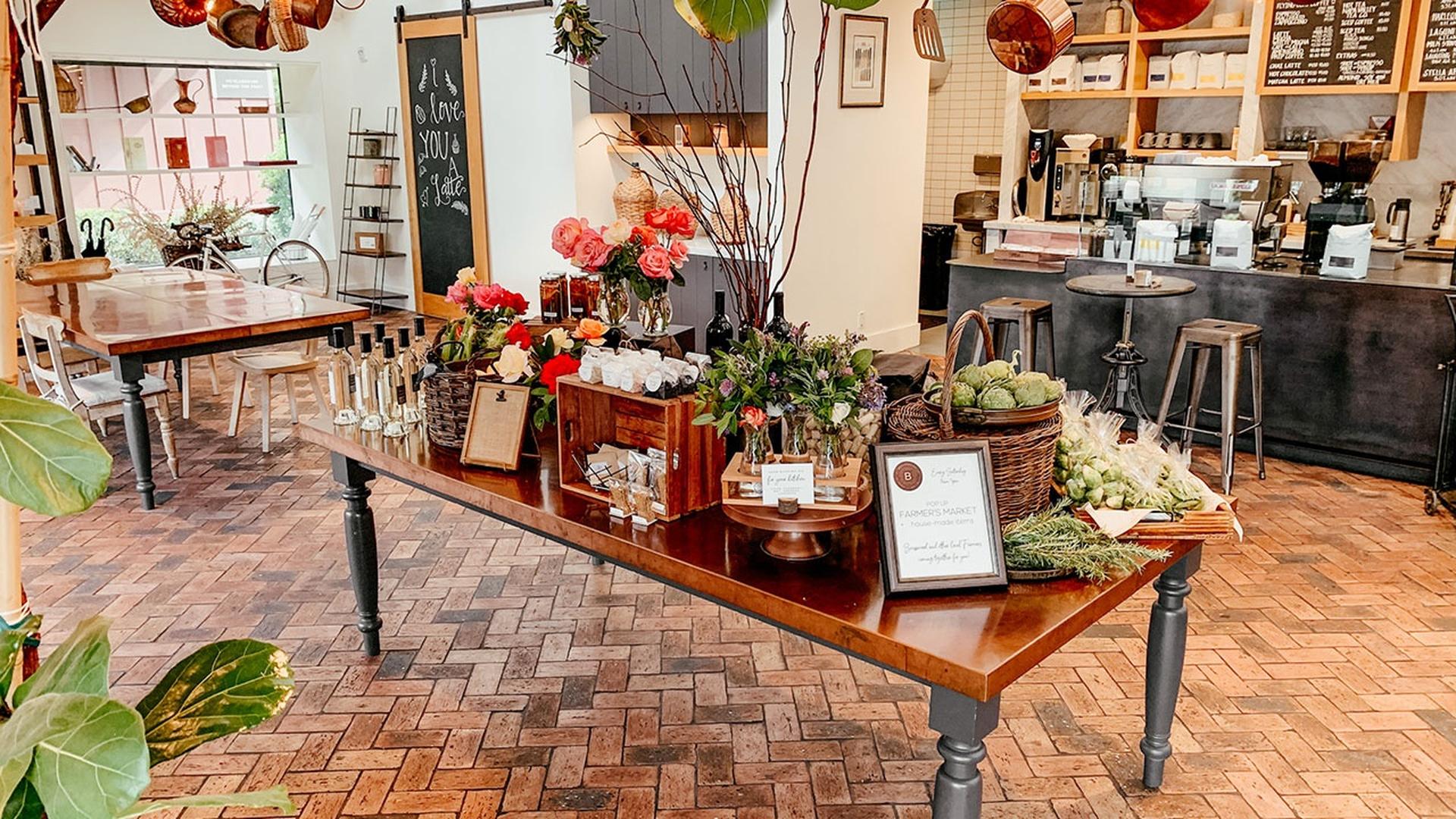 Cozy cafe interior with a display of goods