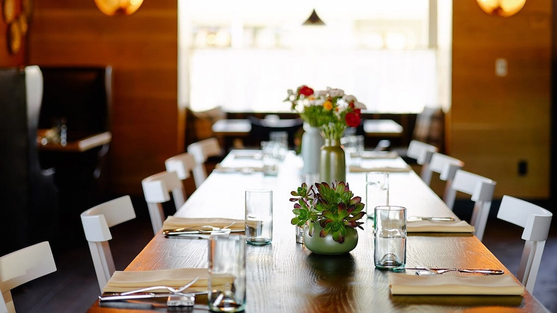 Elegant dining table with flowers and glassware