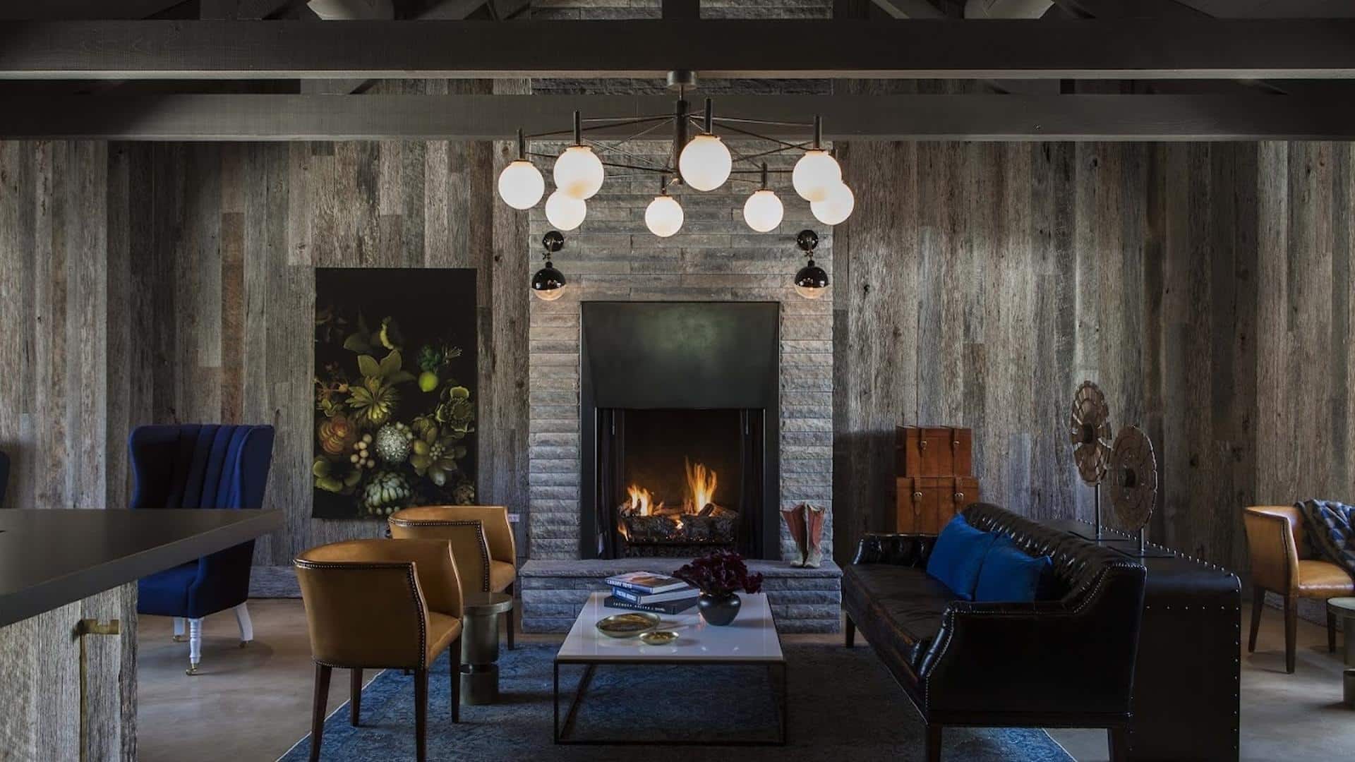 Cozy living room with fireplace and modern chandelier