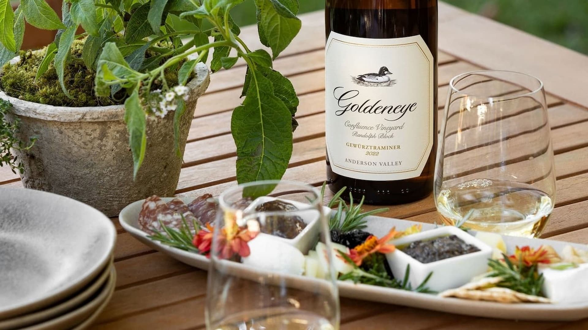 Wine and appetizers on outdoor table