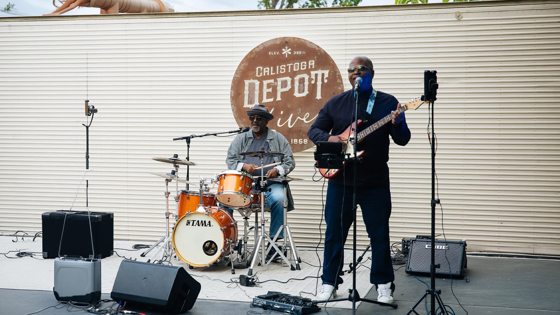 Two musicians performing live at Calistoga Depot.