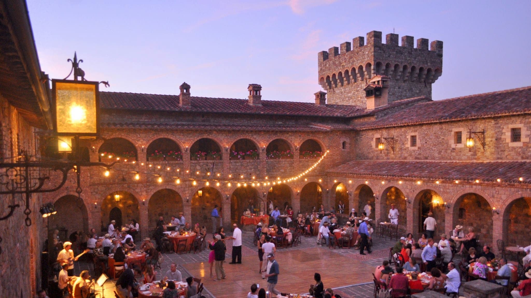 Courtyard dinner event at a medieval-style castle