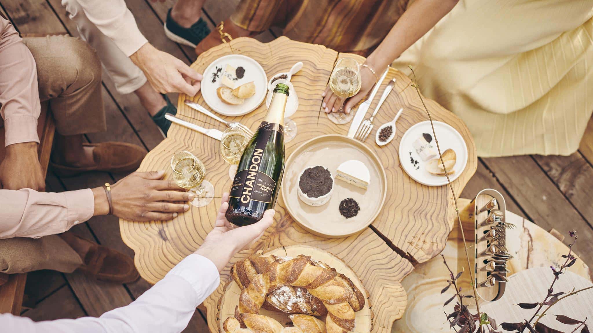 Table setting with Chandon wine and appetizers.