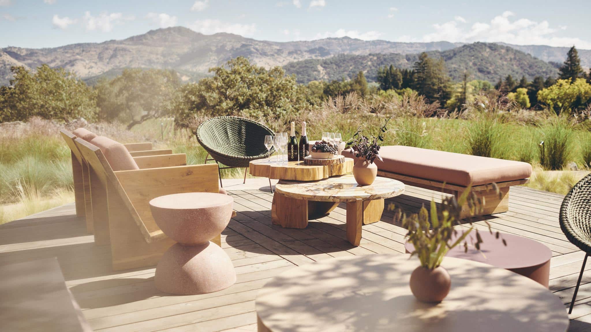 Scenic outdoor patio with mountains in background.