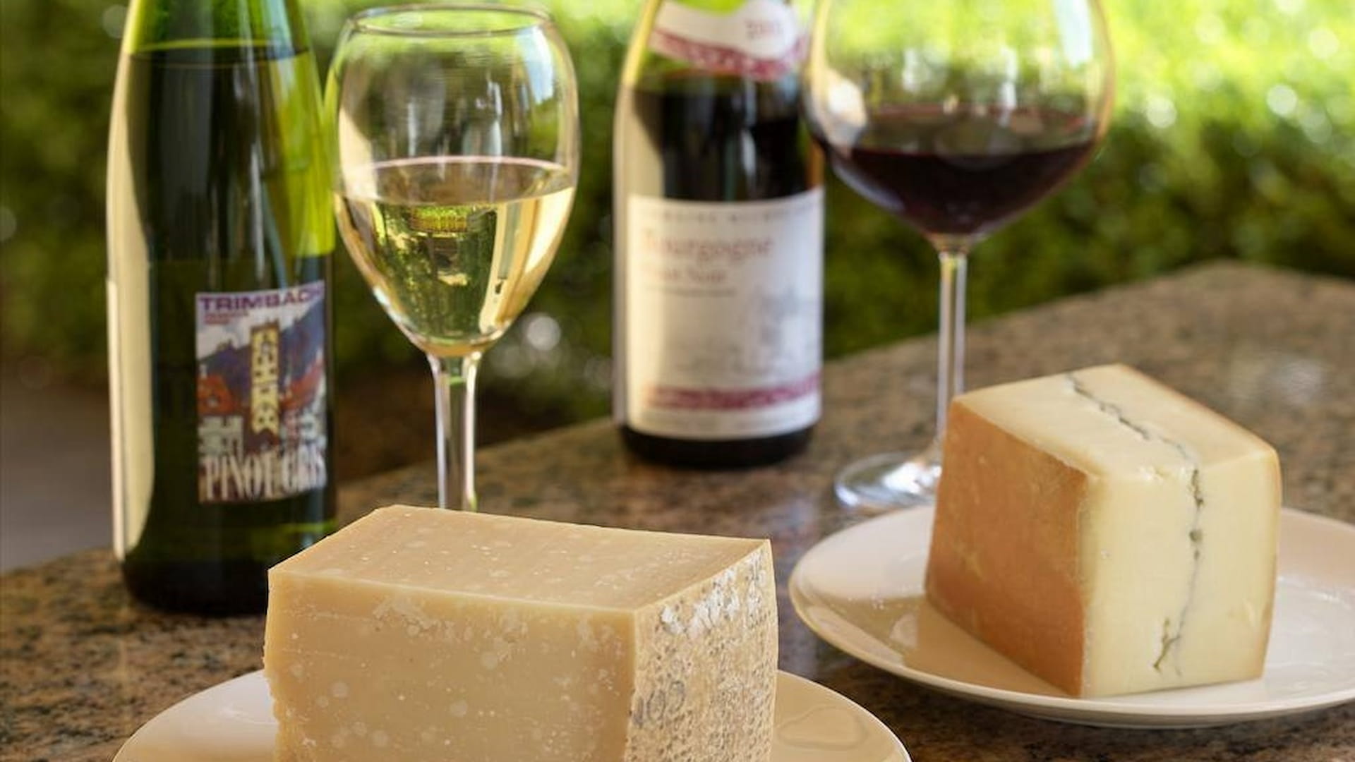 Wine and cheese on patio table