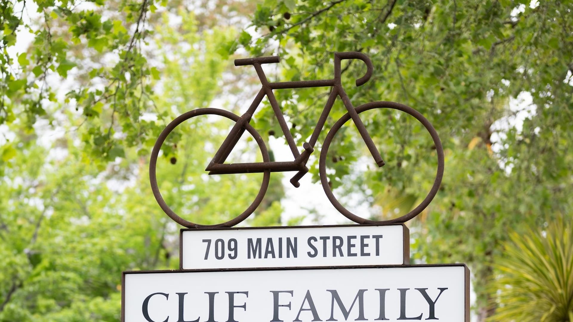Clif Family sign with bicycle art