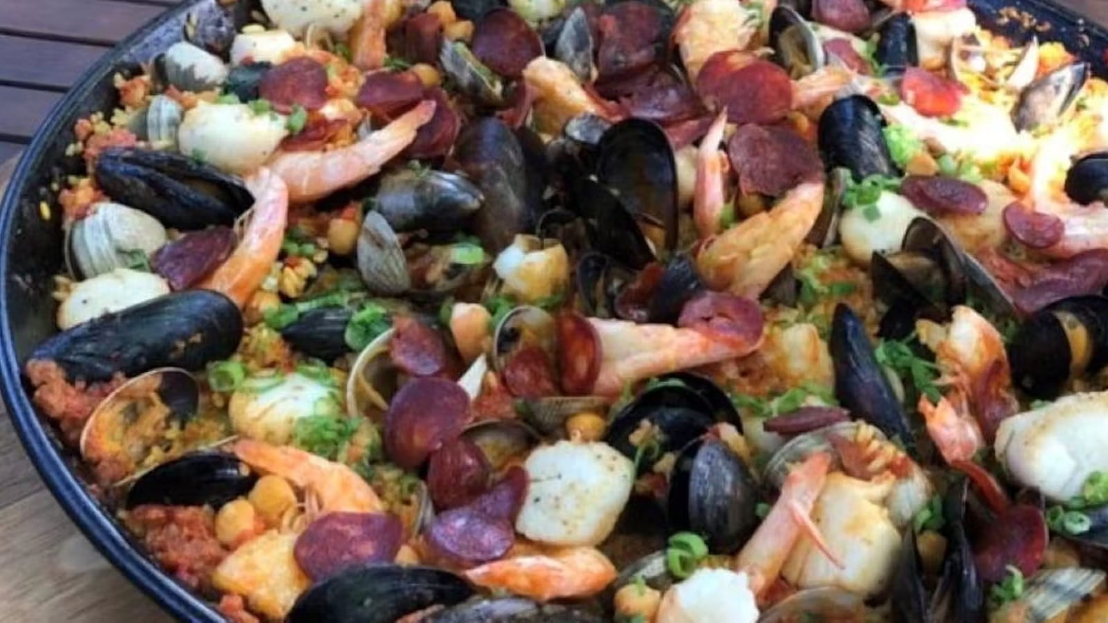 Seafood paella with mussels and shrimp