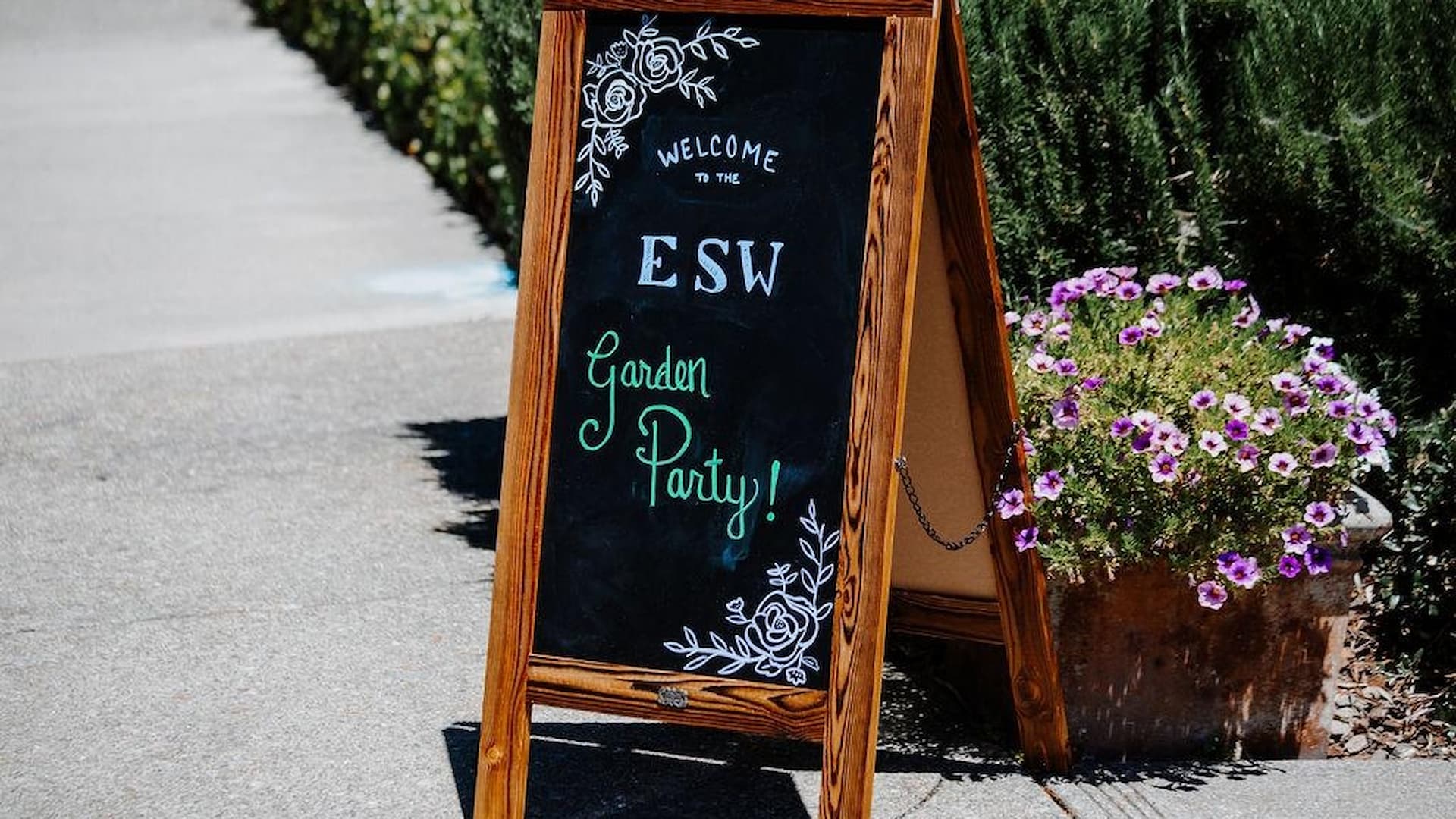 Welcome sign for garden party on easel