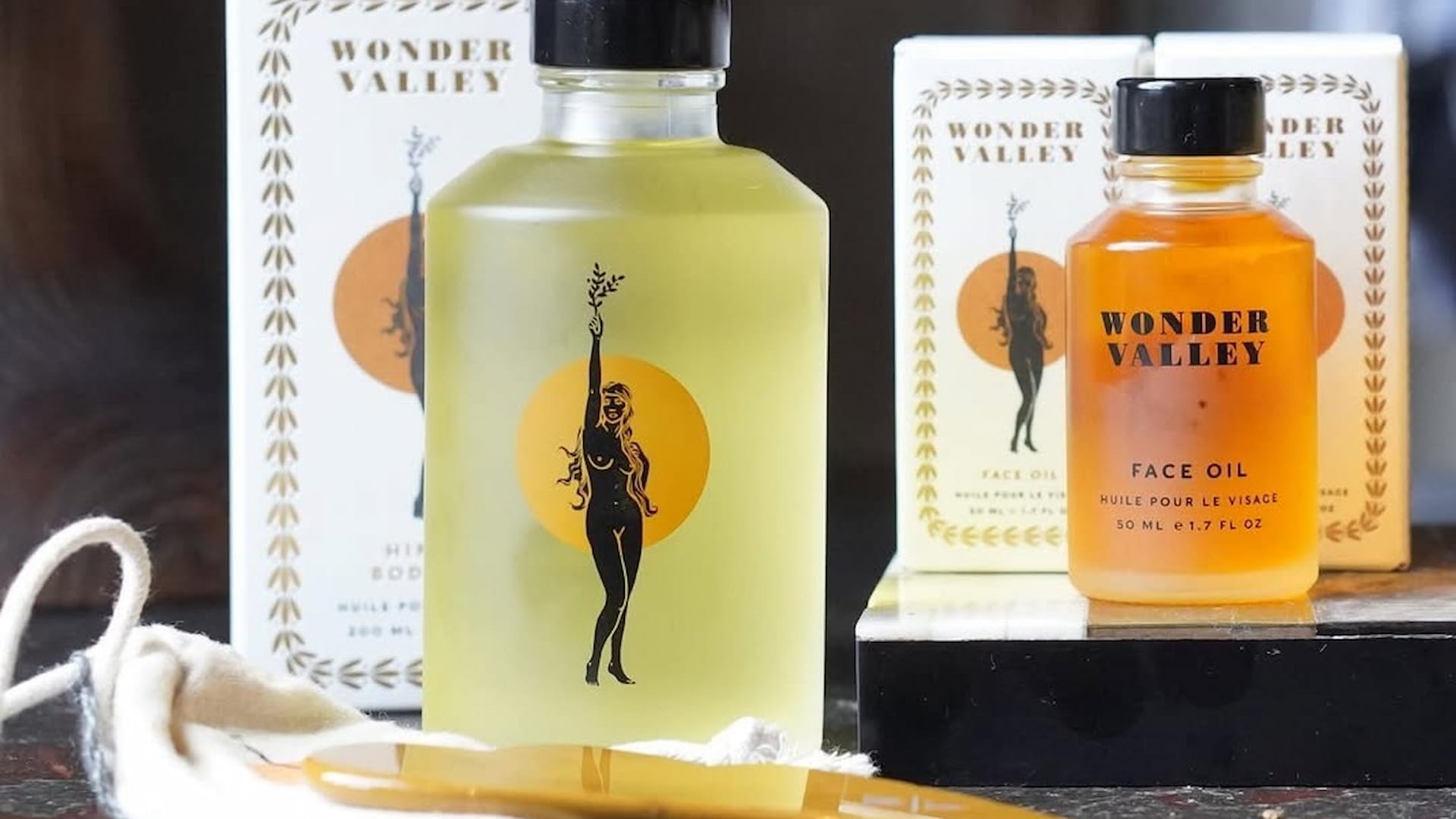 Wonder Valley skincare products displayed on shelf.