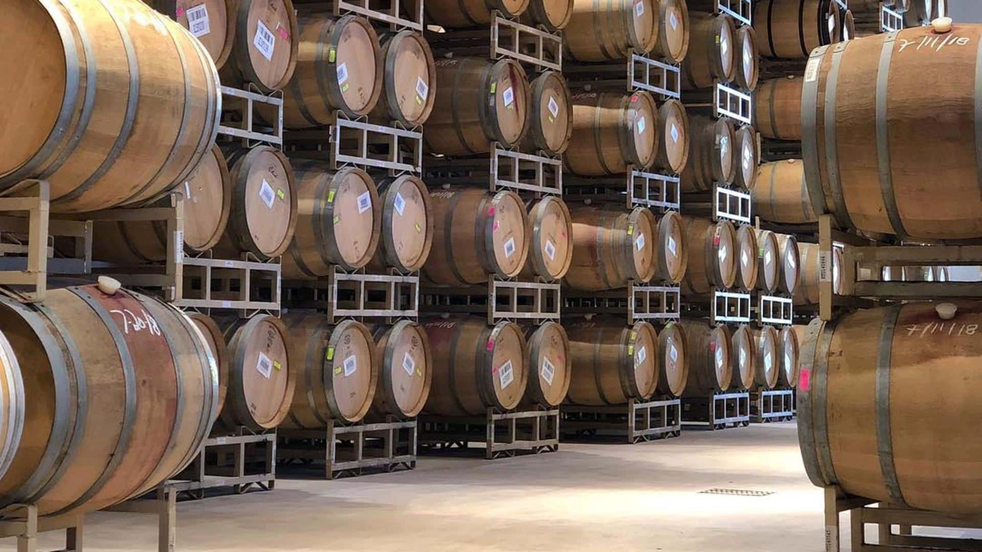 Stacked wine barrels in a cellar