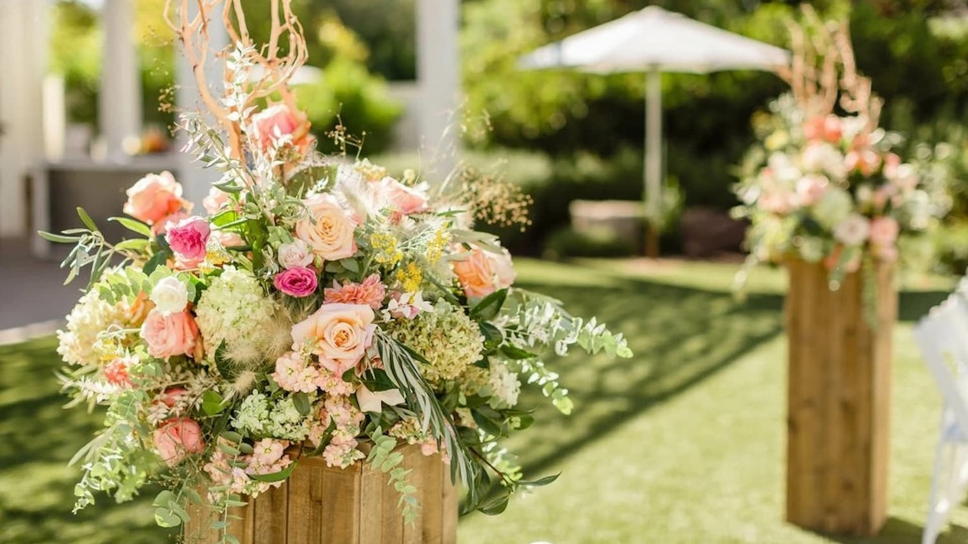 Floral arrangement with roses in outdoor setting