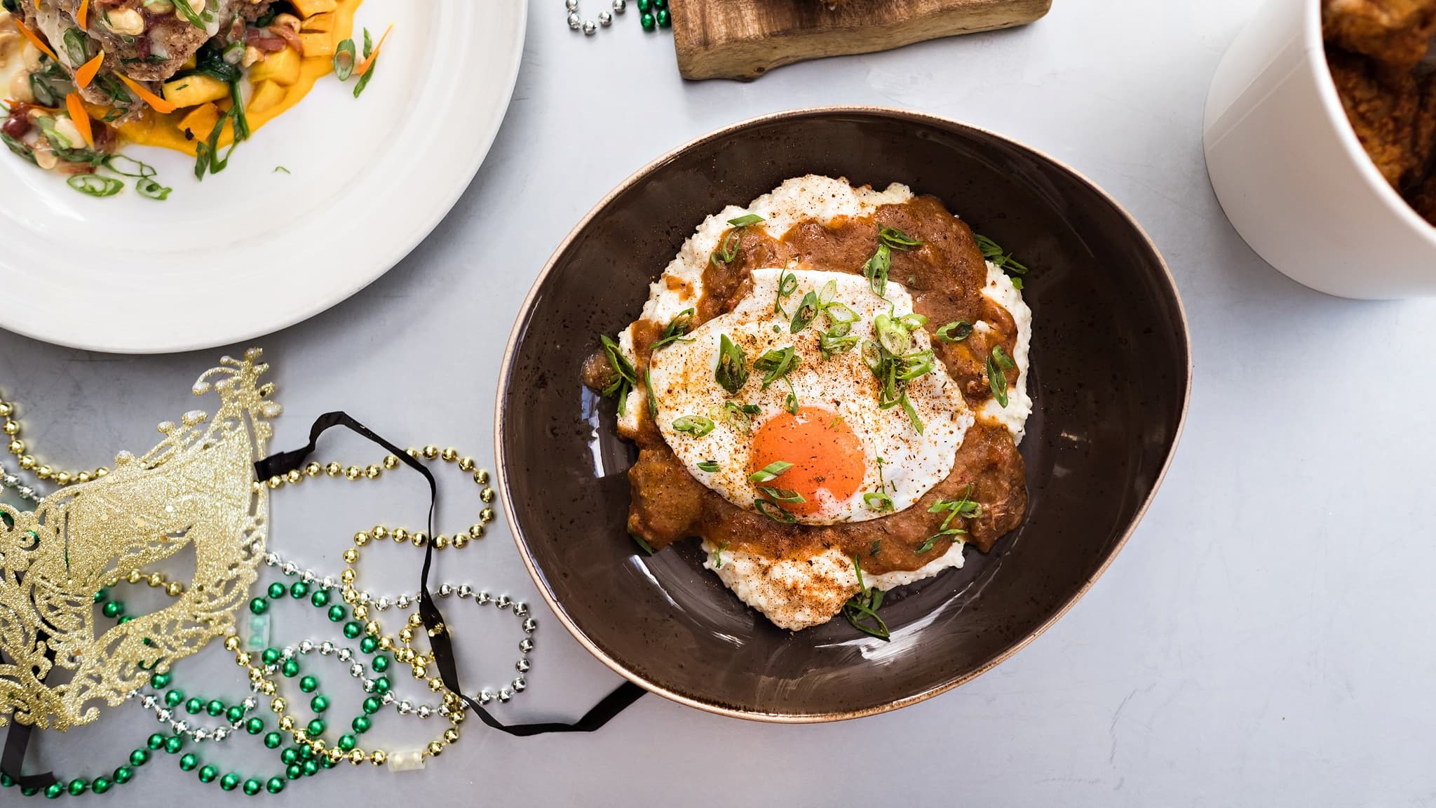 Savory grits with egg and gravy topping