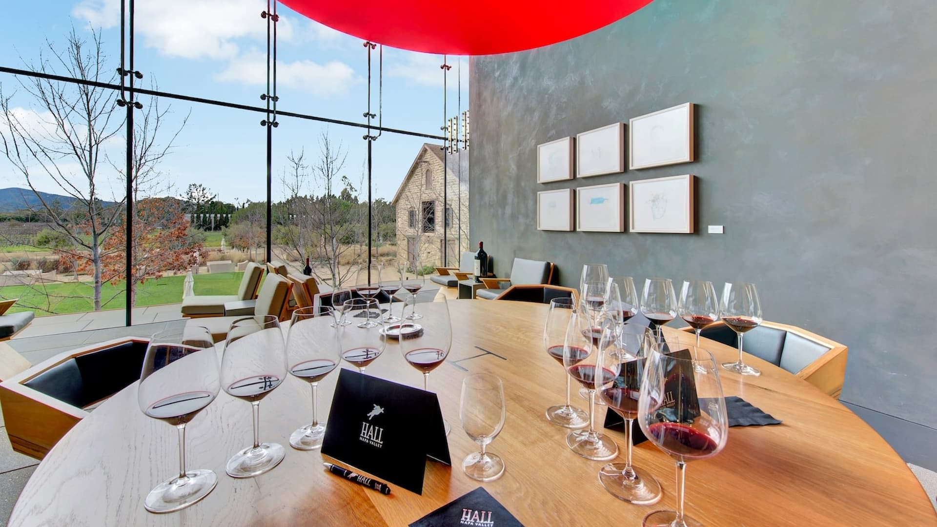 Wine tasting room with scenic vineyard view.