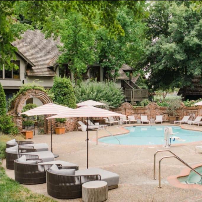 Charming courtyard with pool and seating.