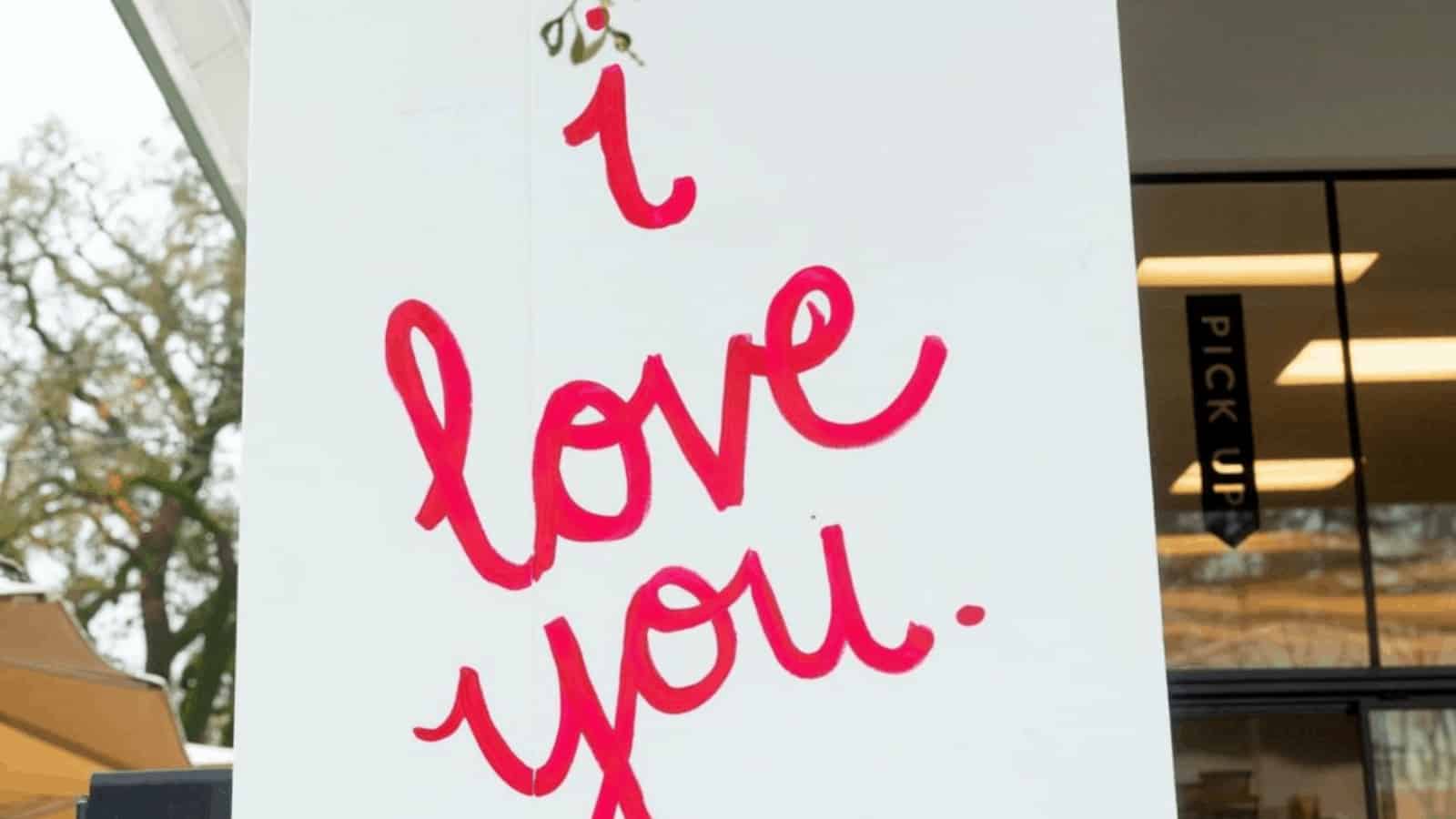 Sign with 'I love you' message