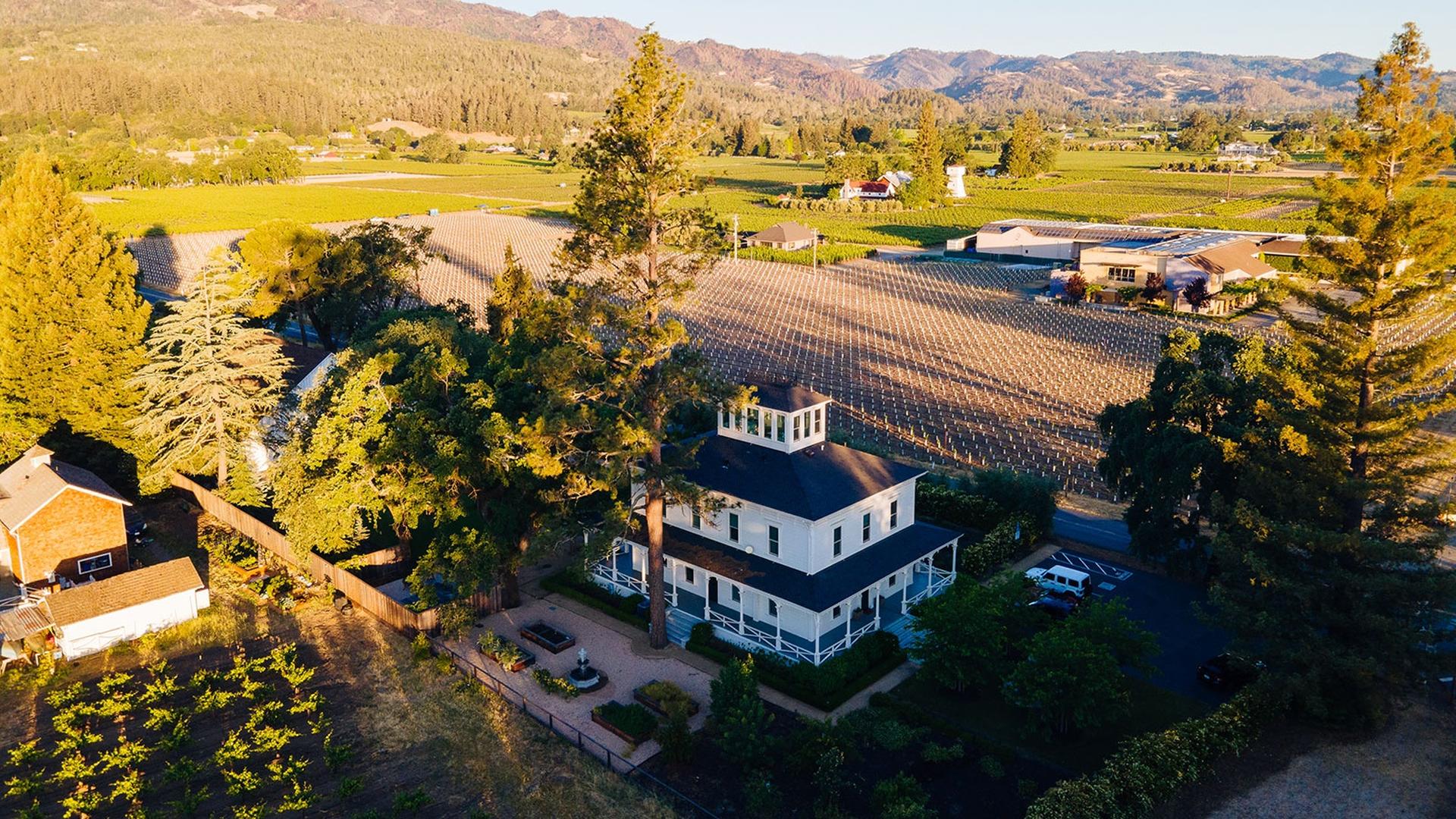 Aerial view of vineyard with farmhouse in Napa Valley.