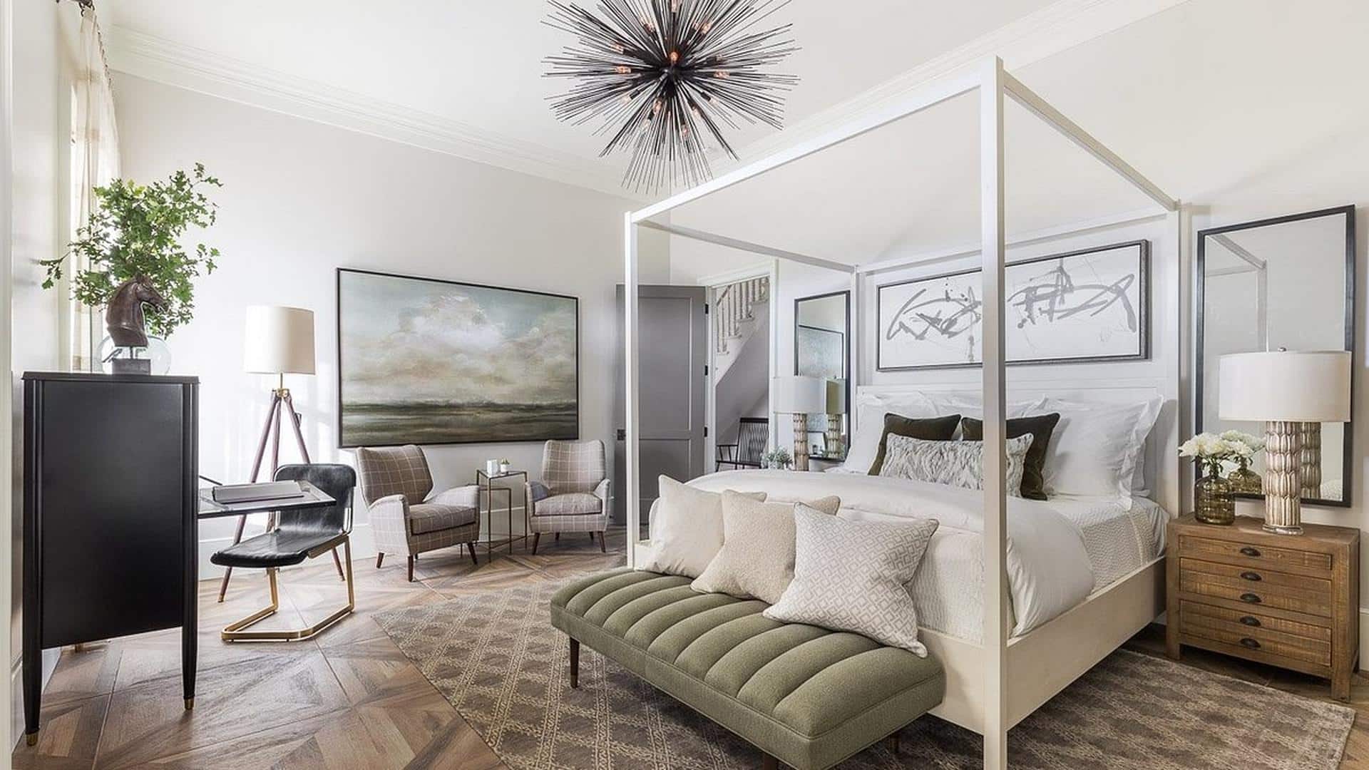 Modern bedroom with elegant decor and furnishings.