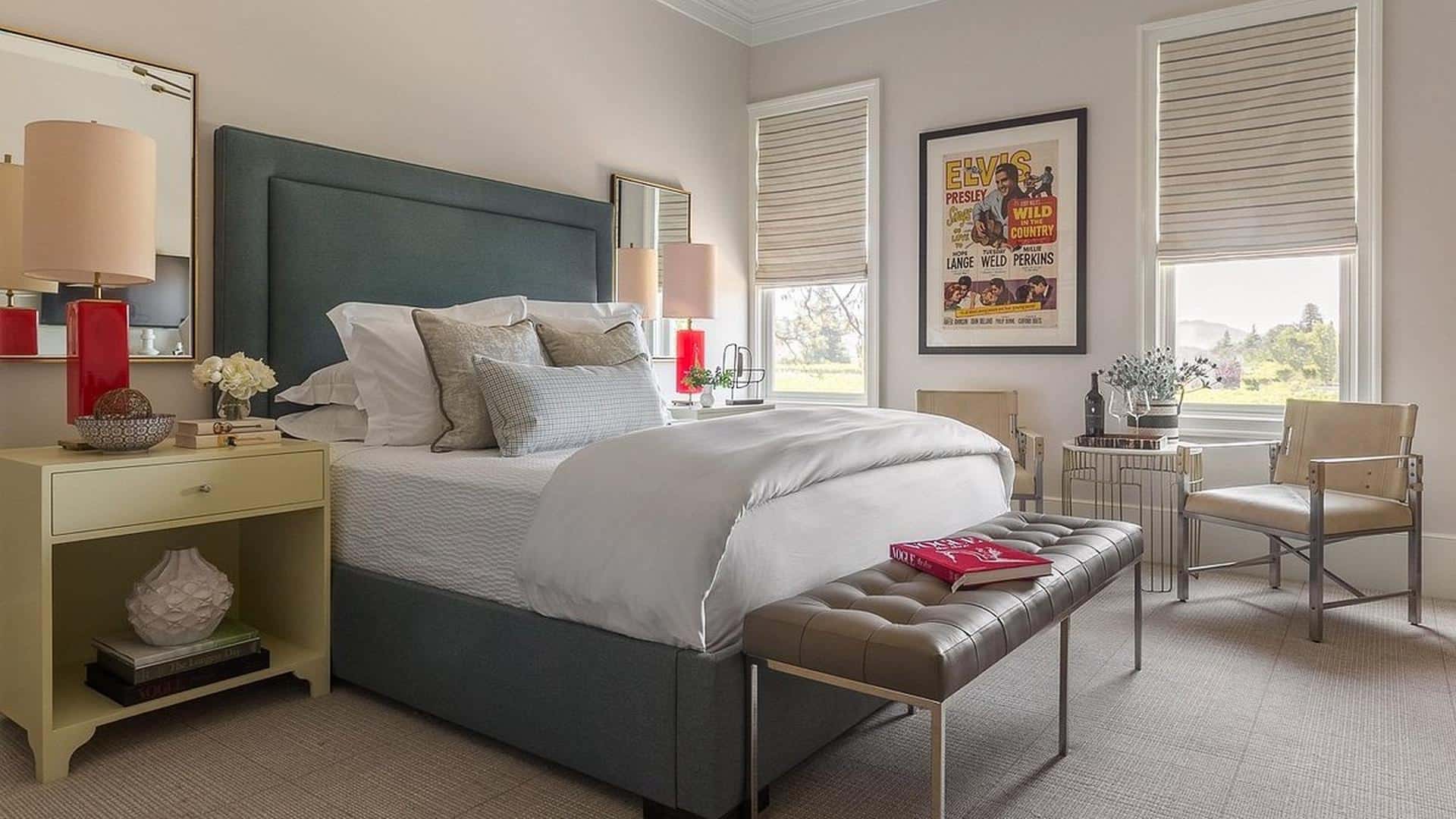 Modern bedroom with cozy decor and natural light.