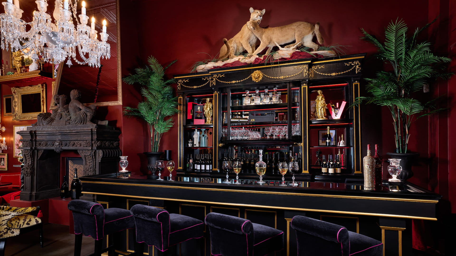 Elegant bar with decorative shelves and chandelier