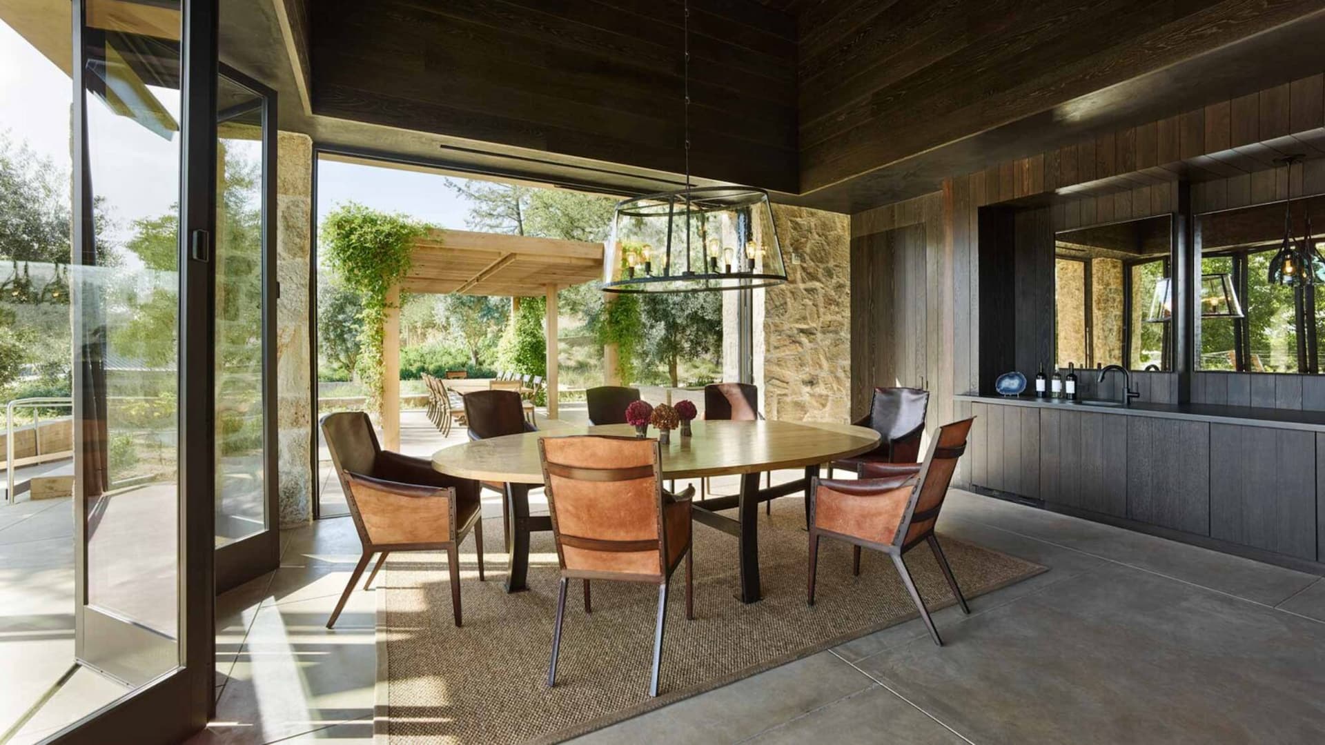 Modern dining room with open view to garden