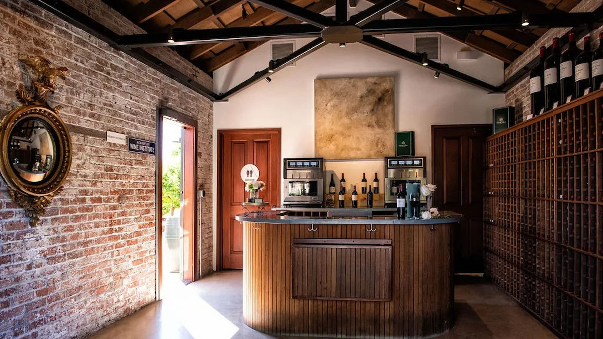 Cozy wine cellar interior with wooden counter.