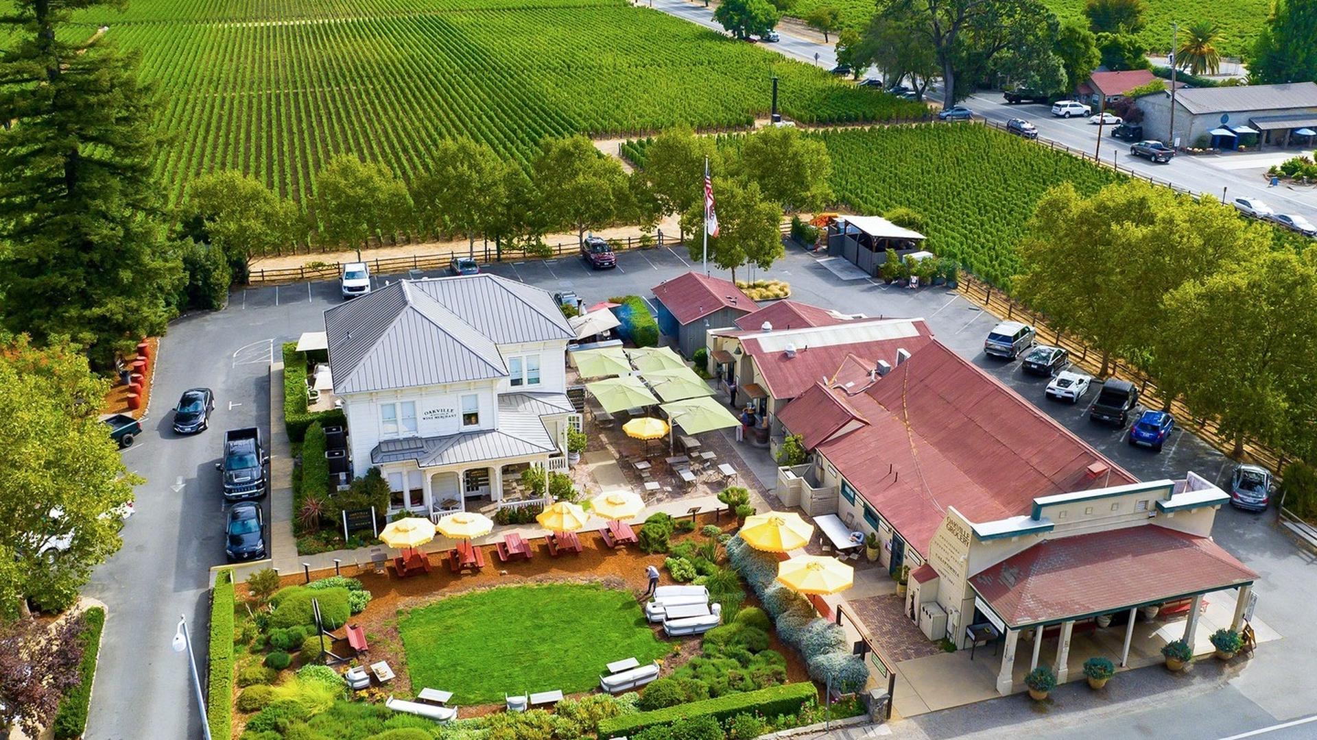 Aerial view of vineyard and restaurant buildings.