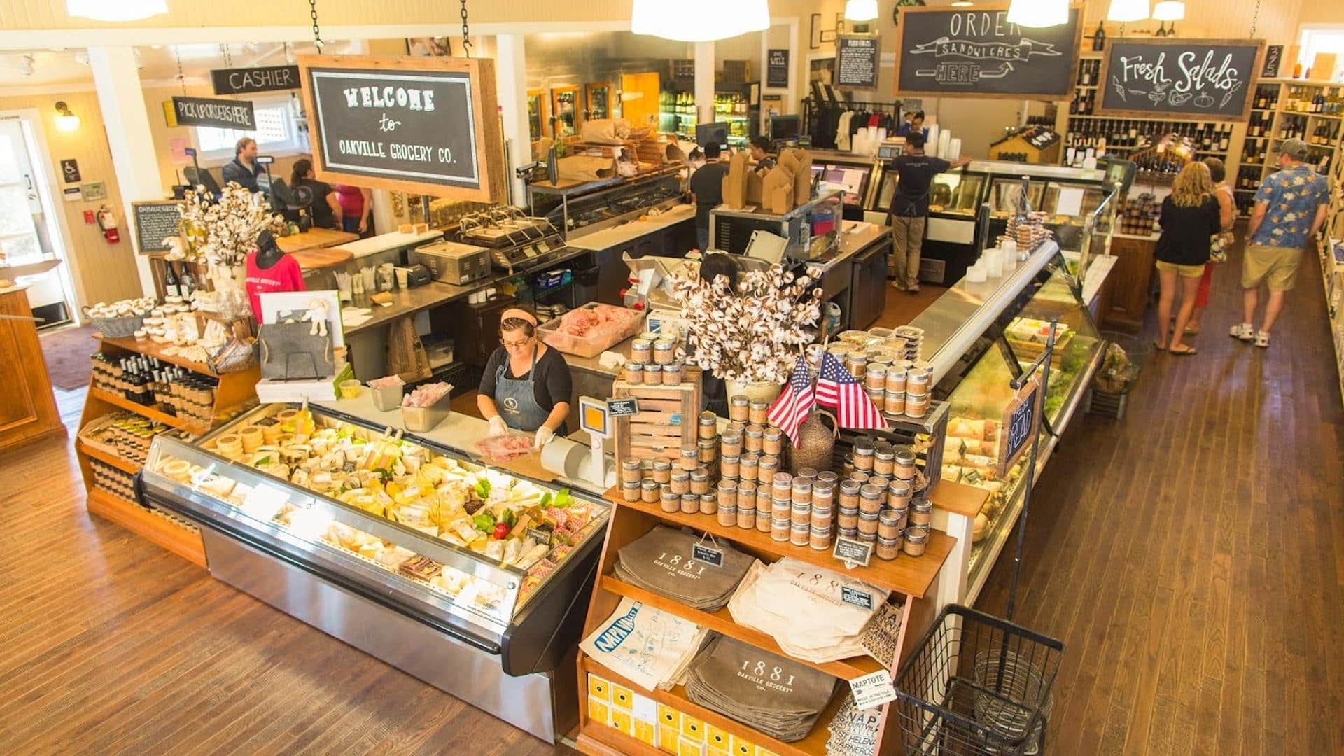 Inside view of Oakville Grocery Co. with customers.