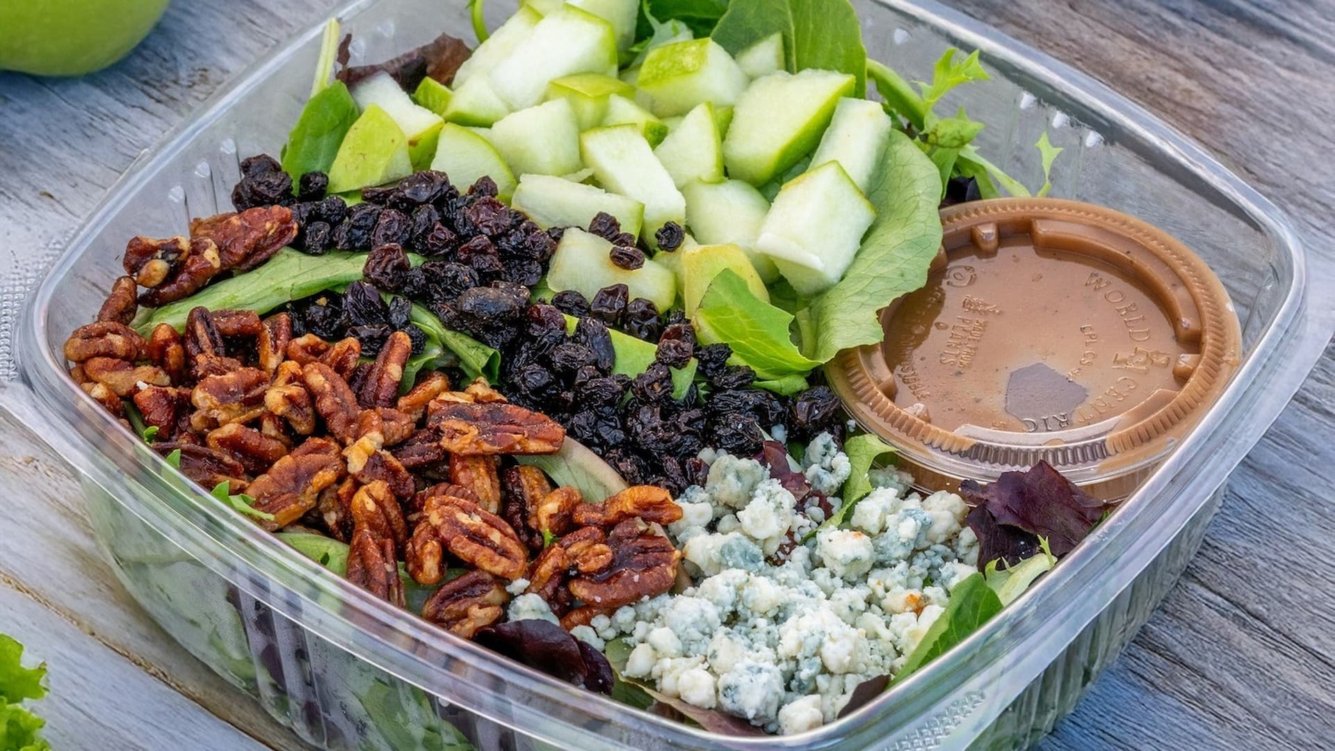 Salad with pecans, apples, raisins, and blue cheese.