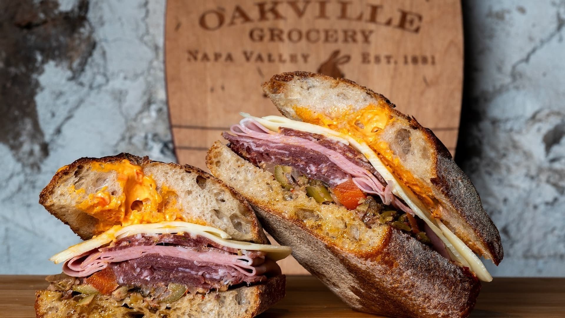 Gourmet sandwich with meats and cheese close-up