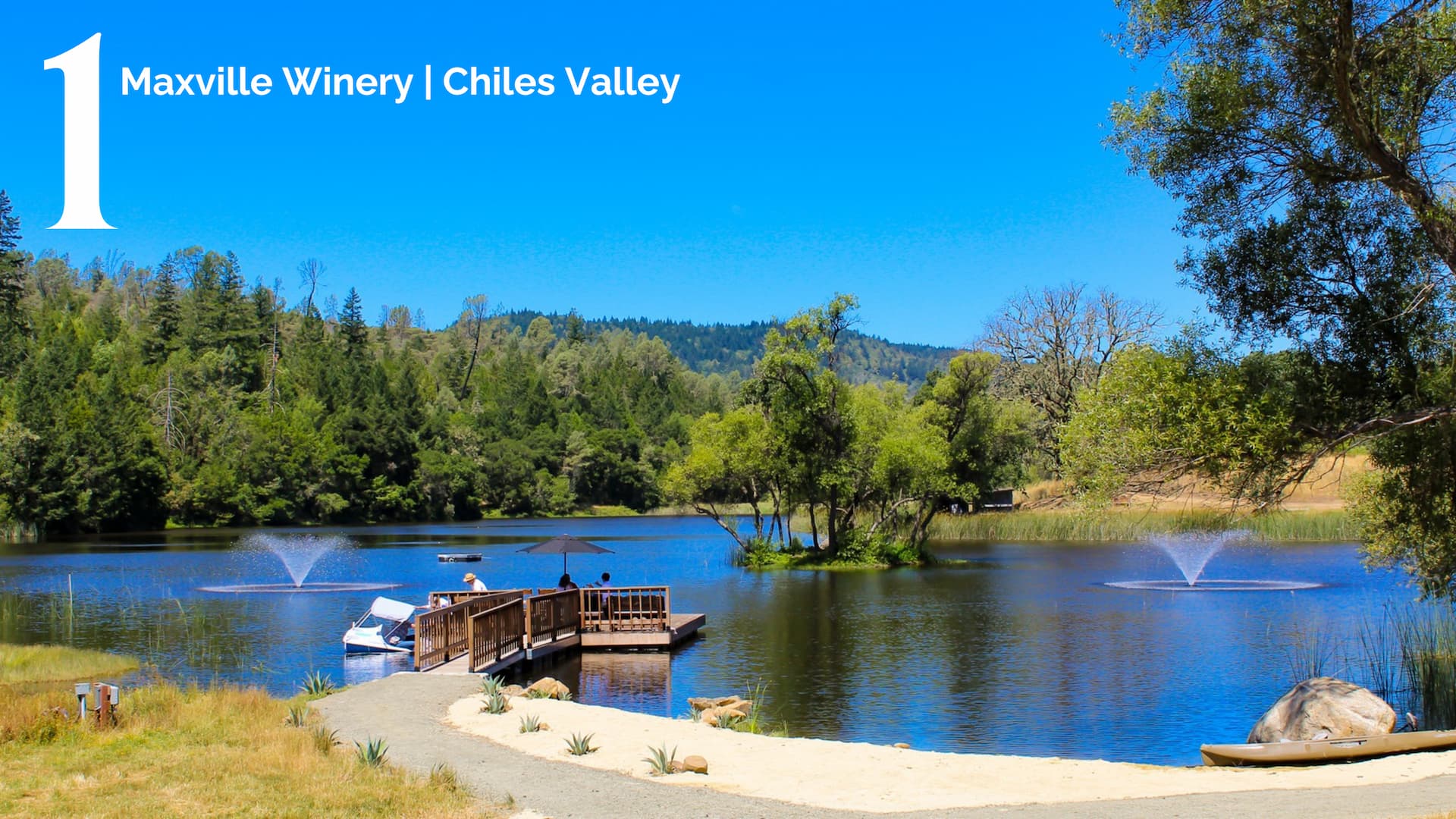 Maxville Winery lake with dock and fountains.