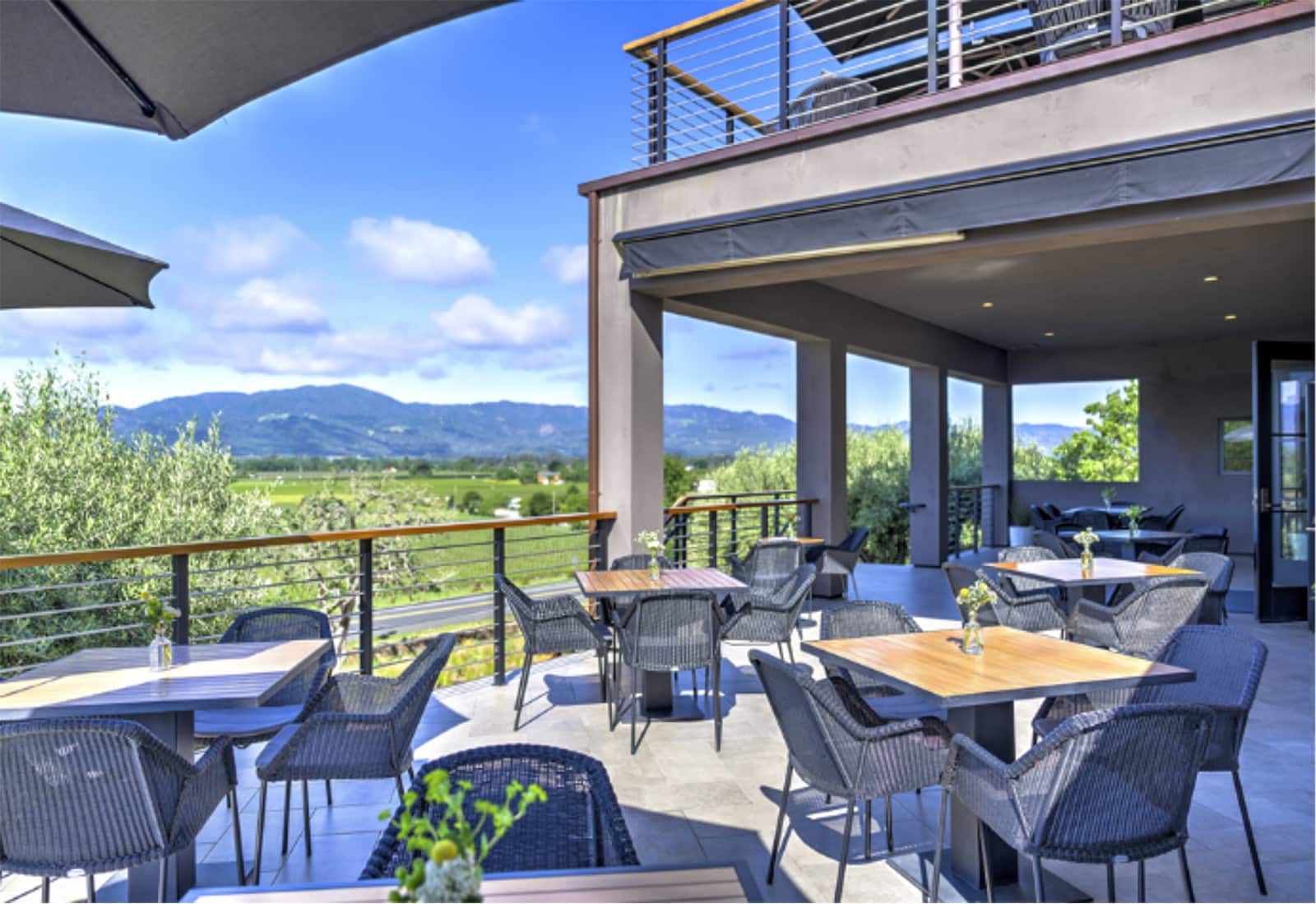 Scenic patio dining overlooking mountains and fields