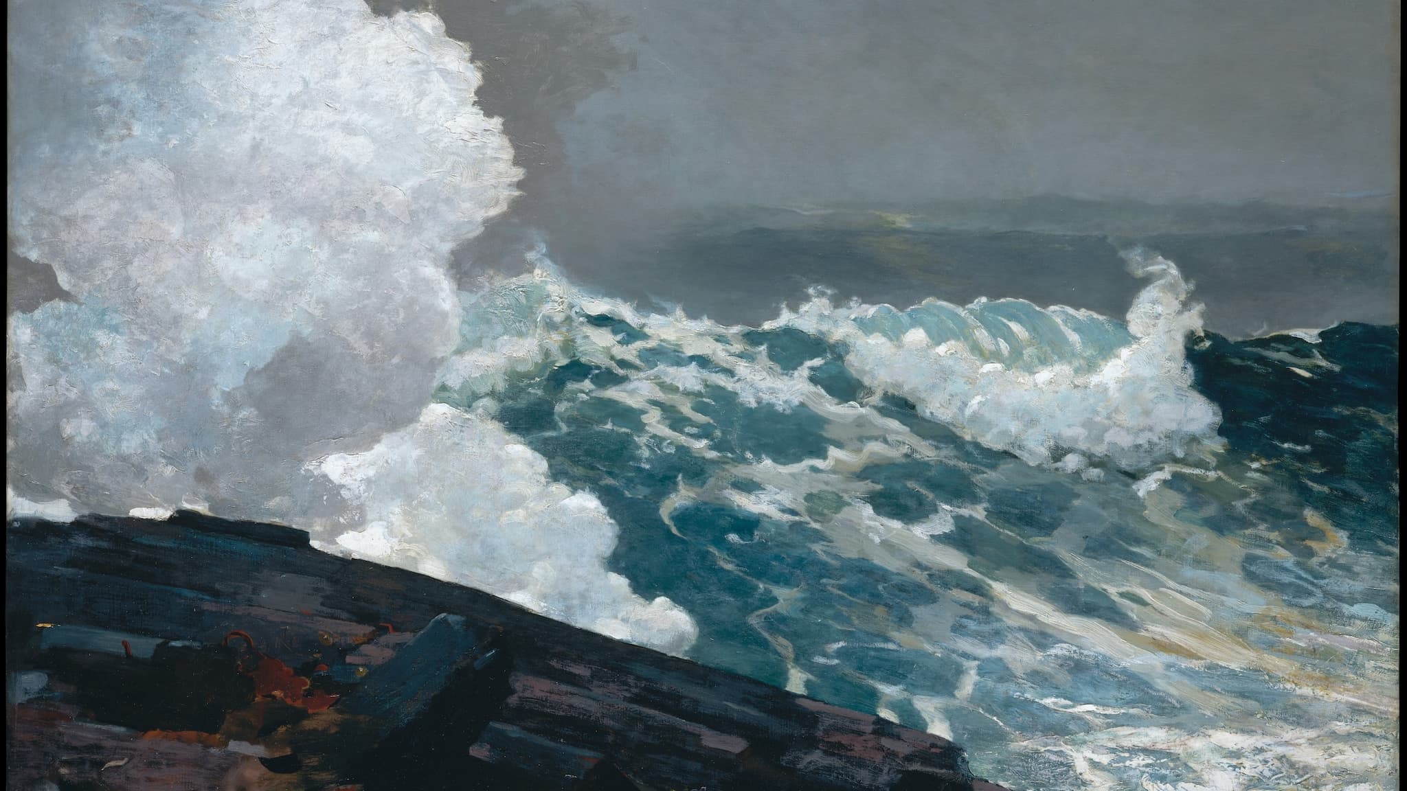 Powerful ocean waves crashing under cloudy sky