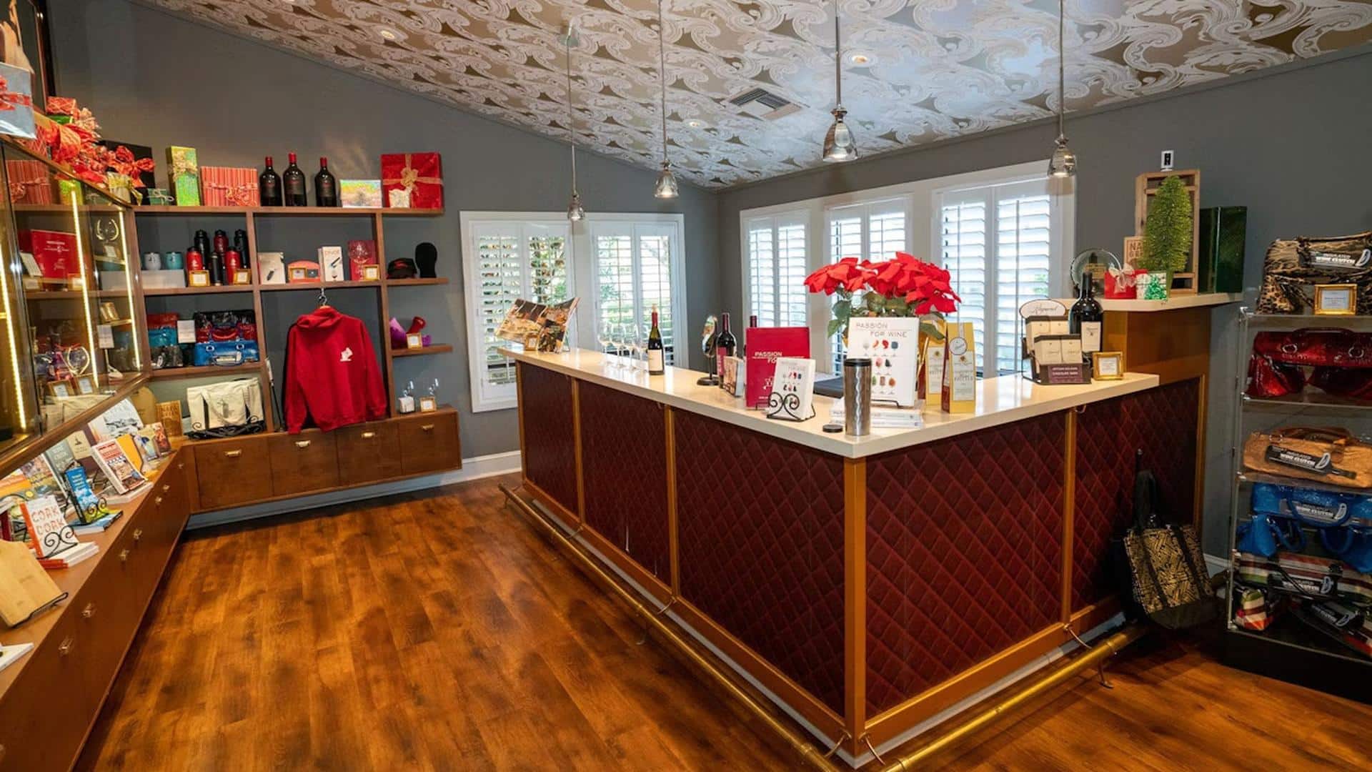 Cozy wine tasting room with merchandise display.