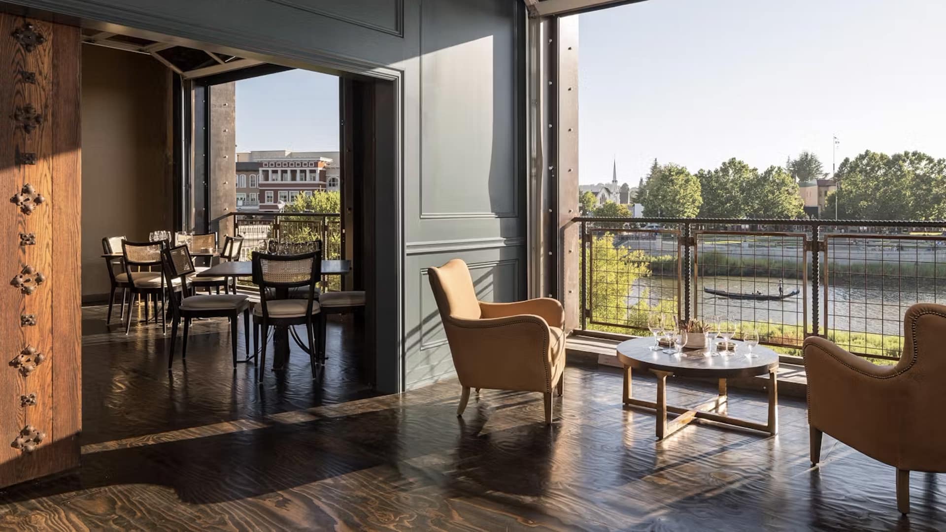 Elegant riverside dining with scenic view.