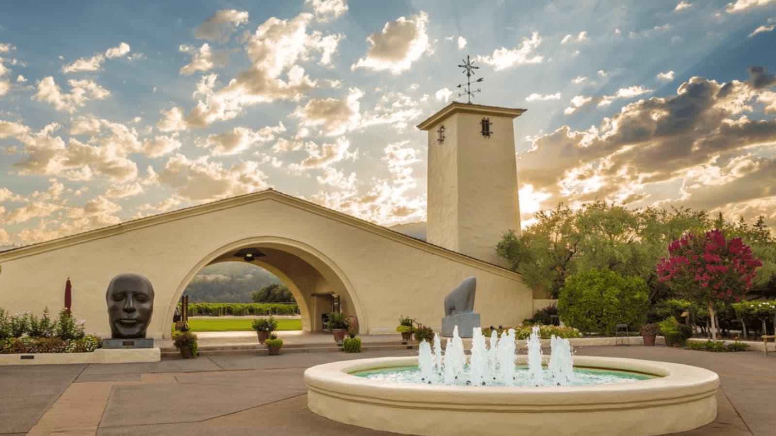 Winery entrance with fountain and sculptures