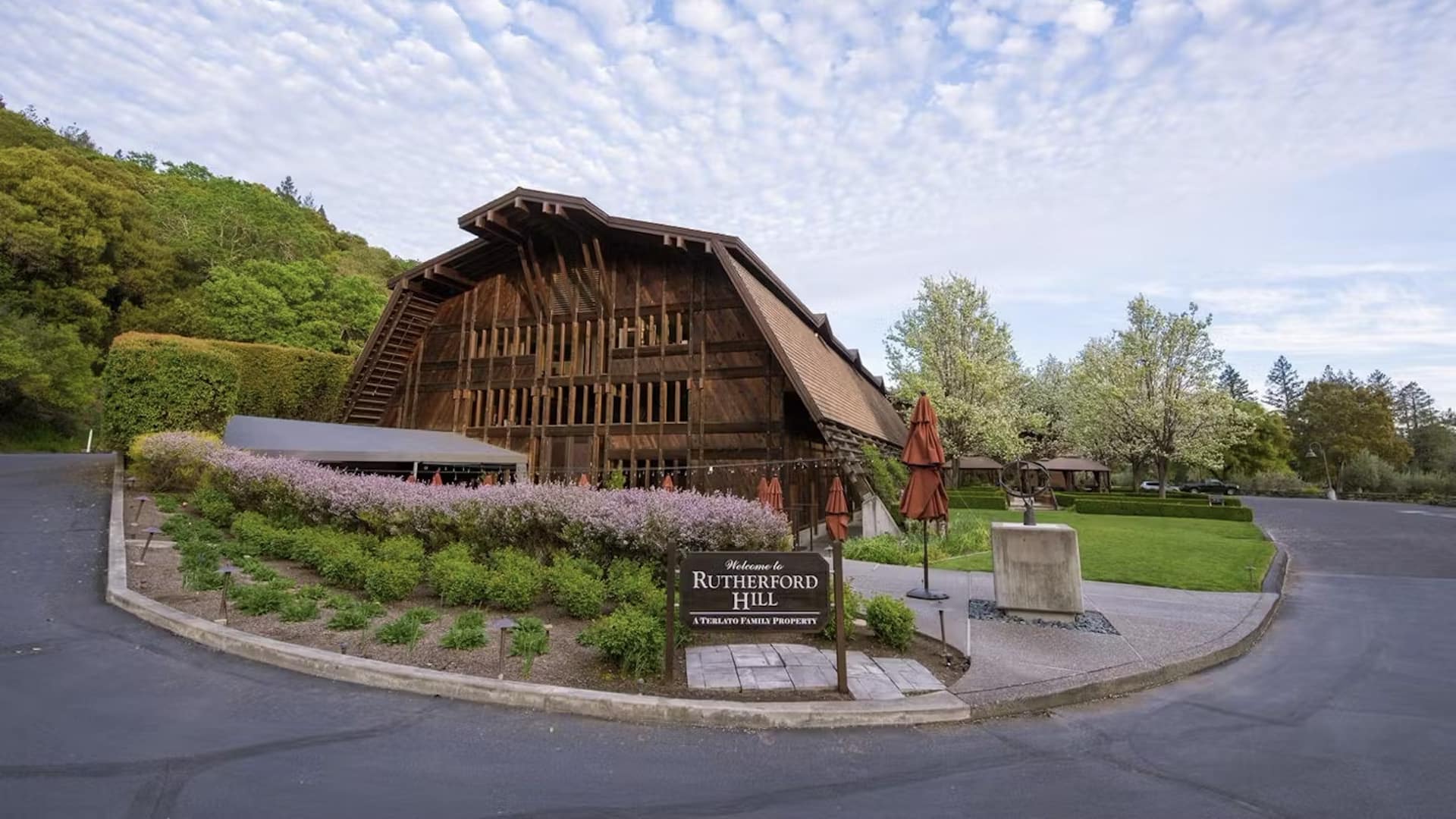 Rutherford Hill winery entrance with lush greenery.