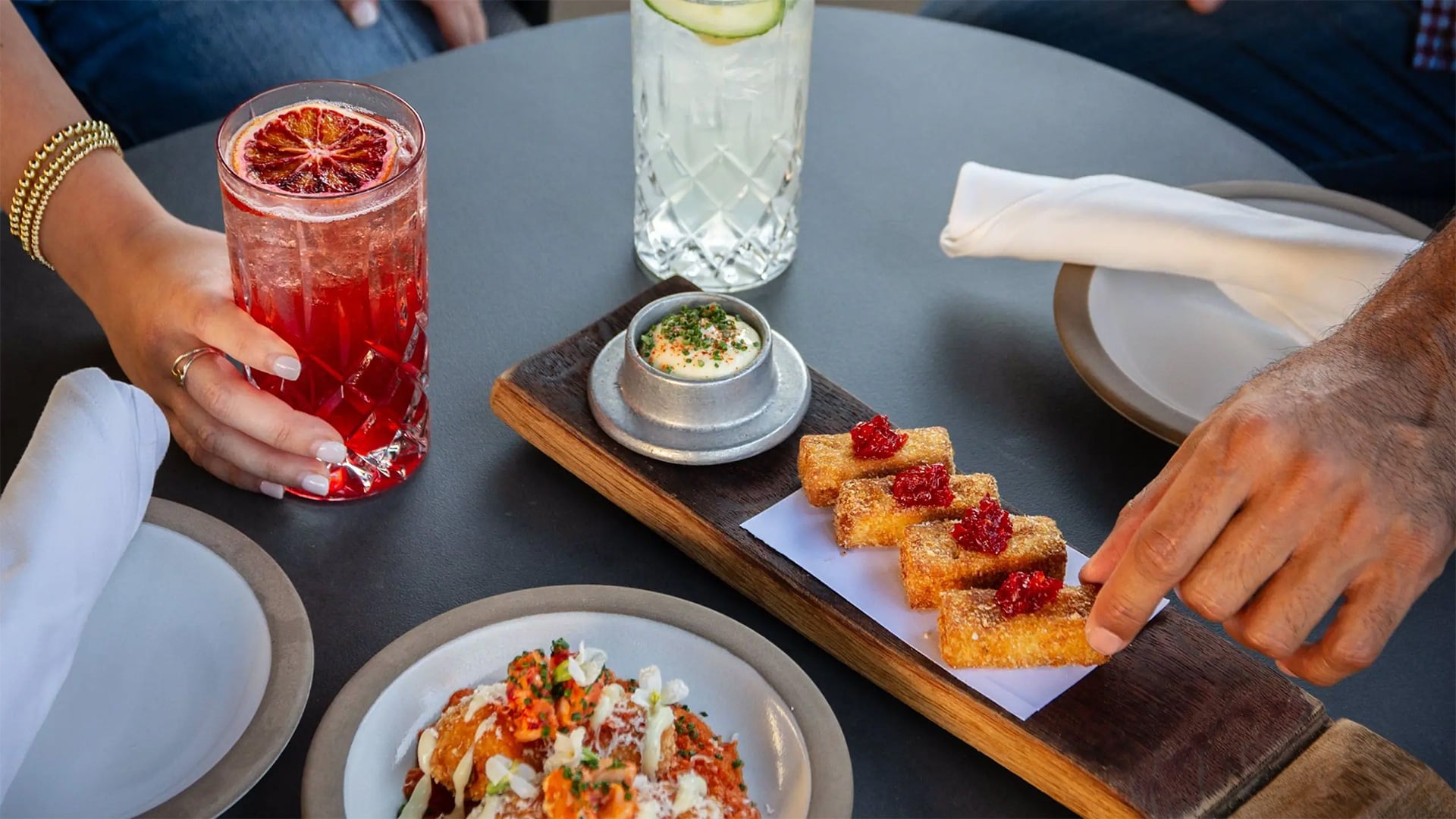 Cocktails and appetizers on restaurant table