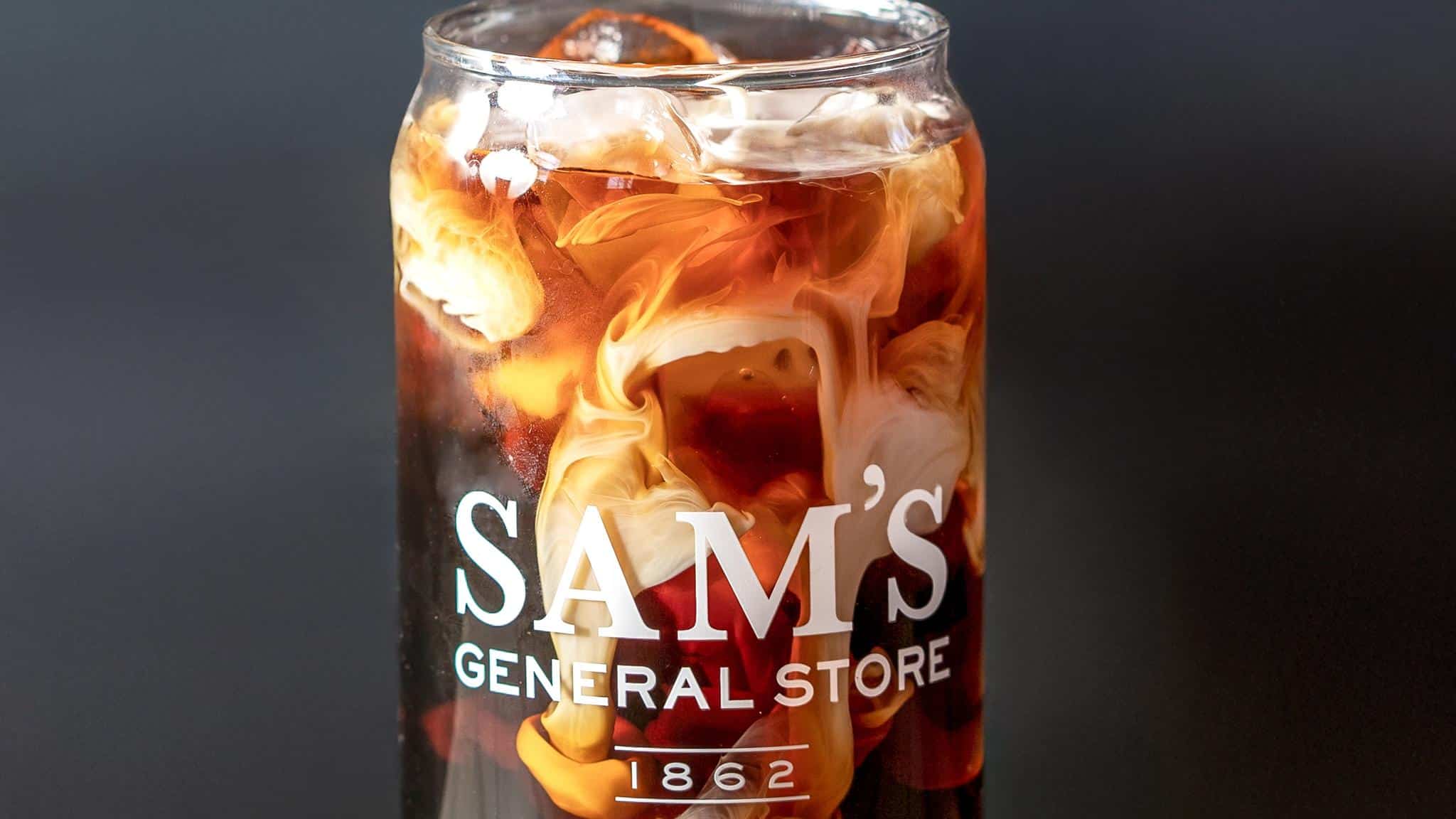 Iced coffee in a Sam's General Store glass.