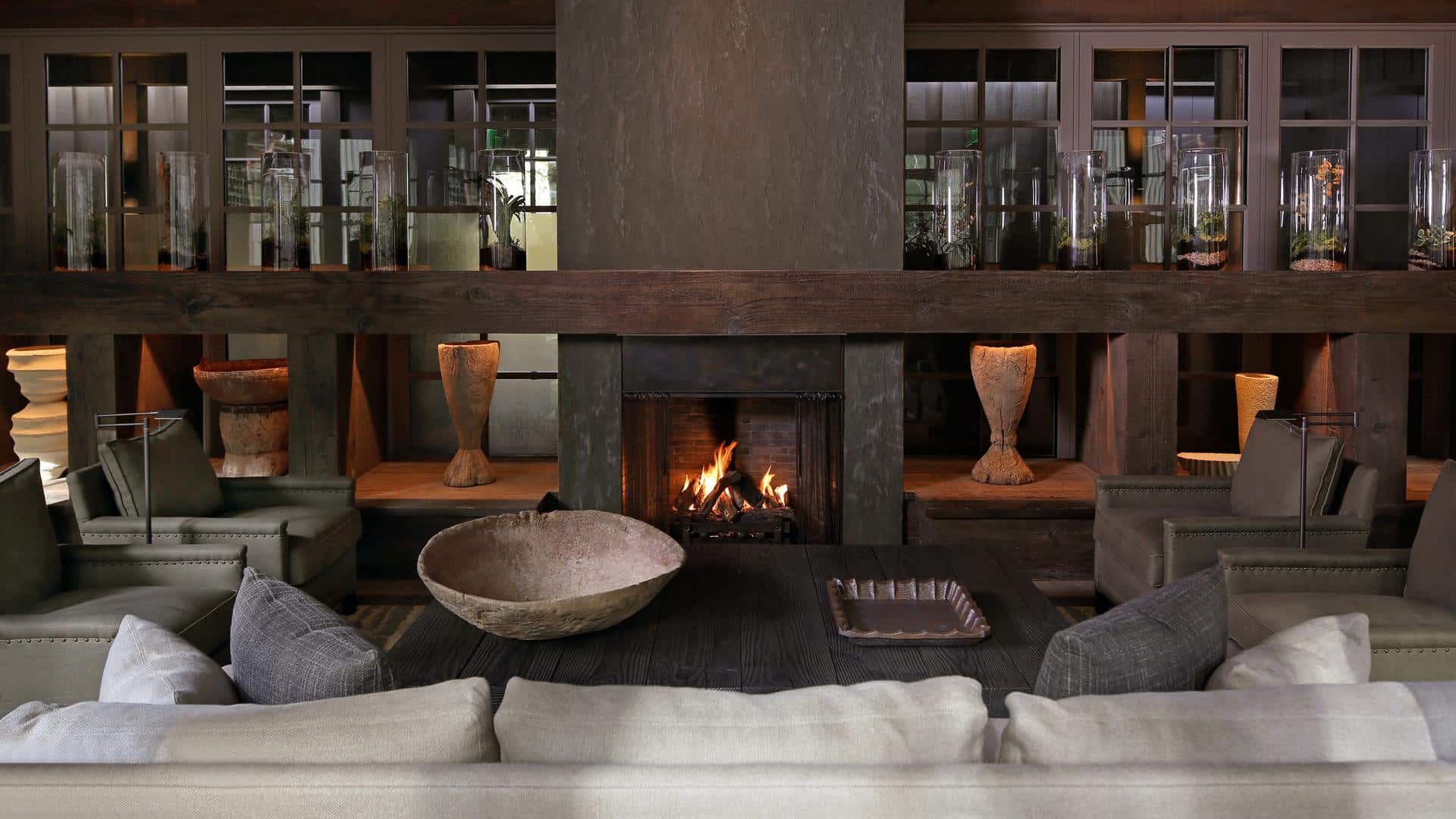 Cozy living room with fireplace and modern decor.