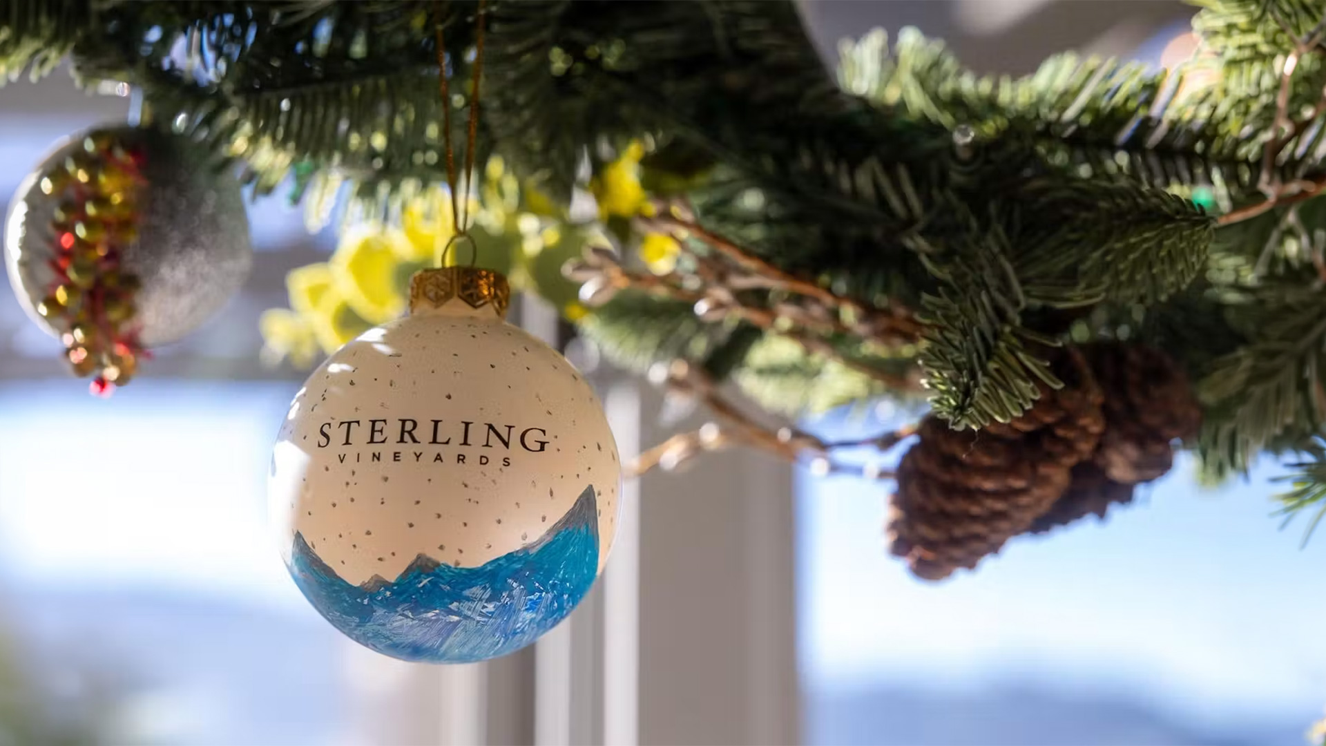 Sterling Vineyards ornament hanging on a Christmas tree