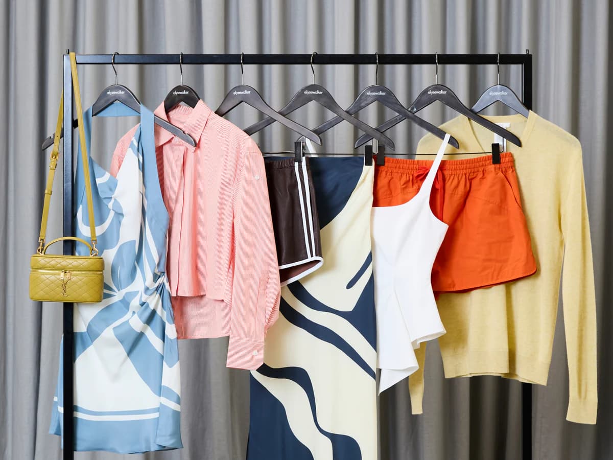 Colorful women's outfits on a clothing rack