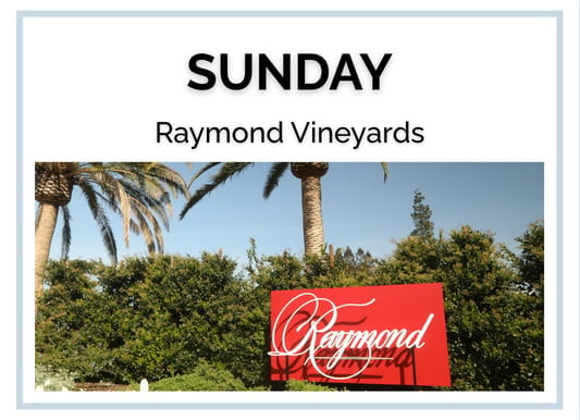 Raymond Vineyards sign beneath palm trees on Sunday