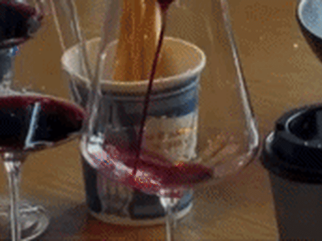 Red wine being poured into glass