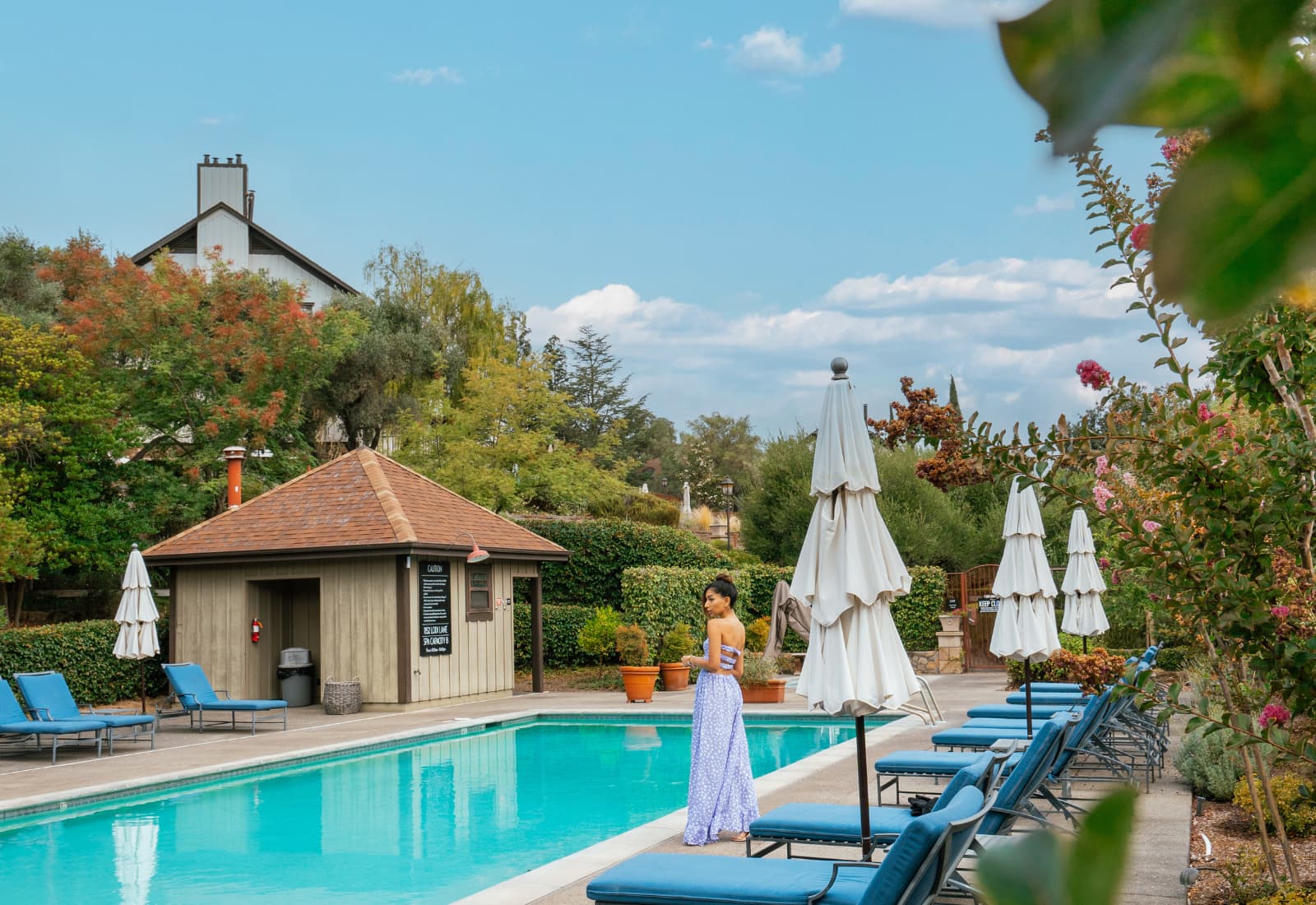 Woman by pool at a resort